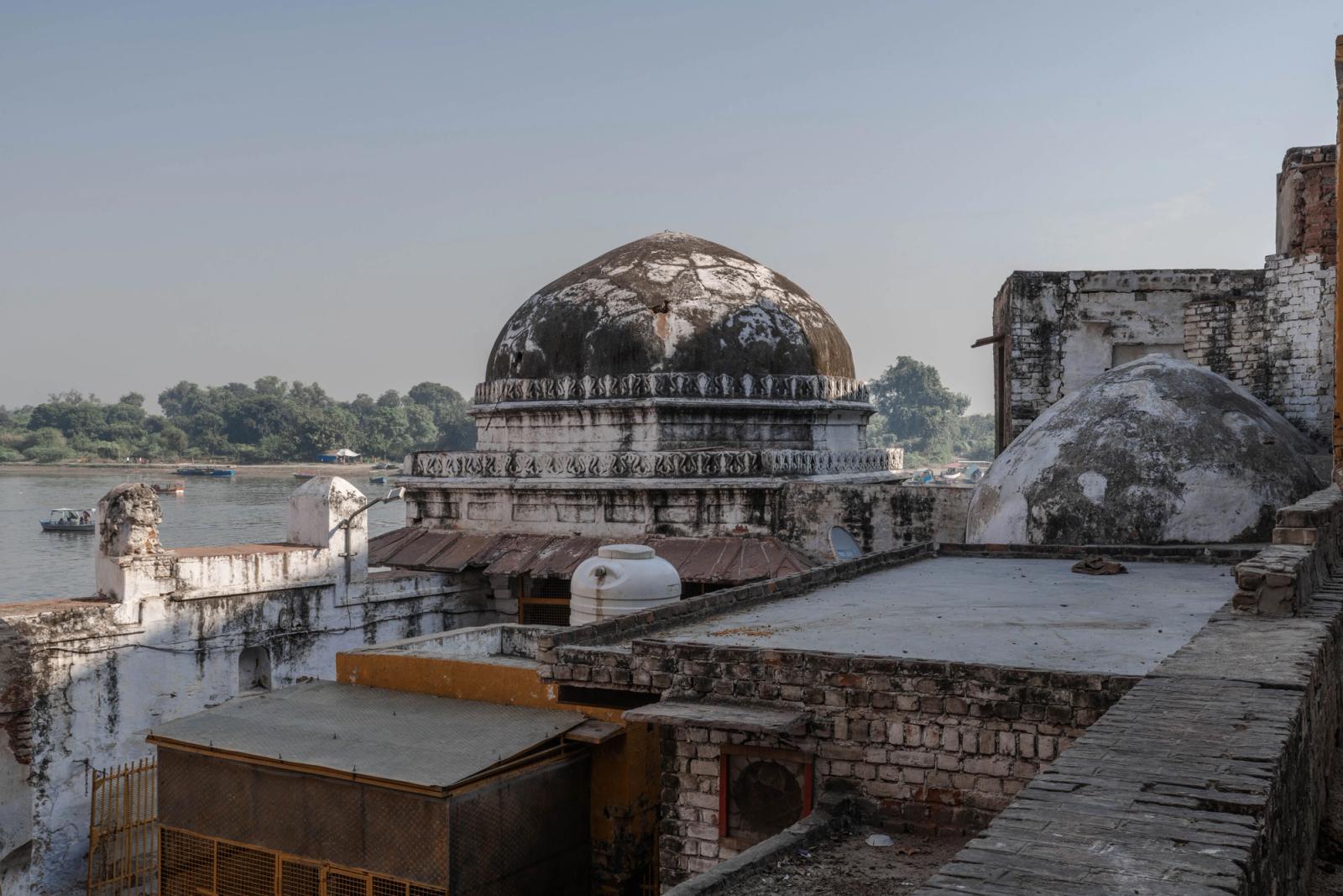 Ancient architectural structures by the Yamuna River in Mathura, India