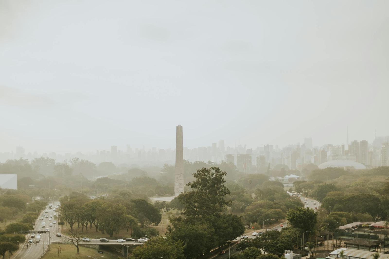 Aerial shot of Obelisk in Ibirapuera Park, São Paulo, surrounded by lush greenery and cityscape