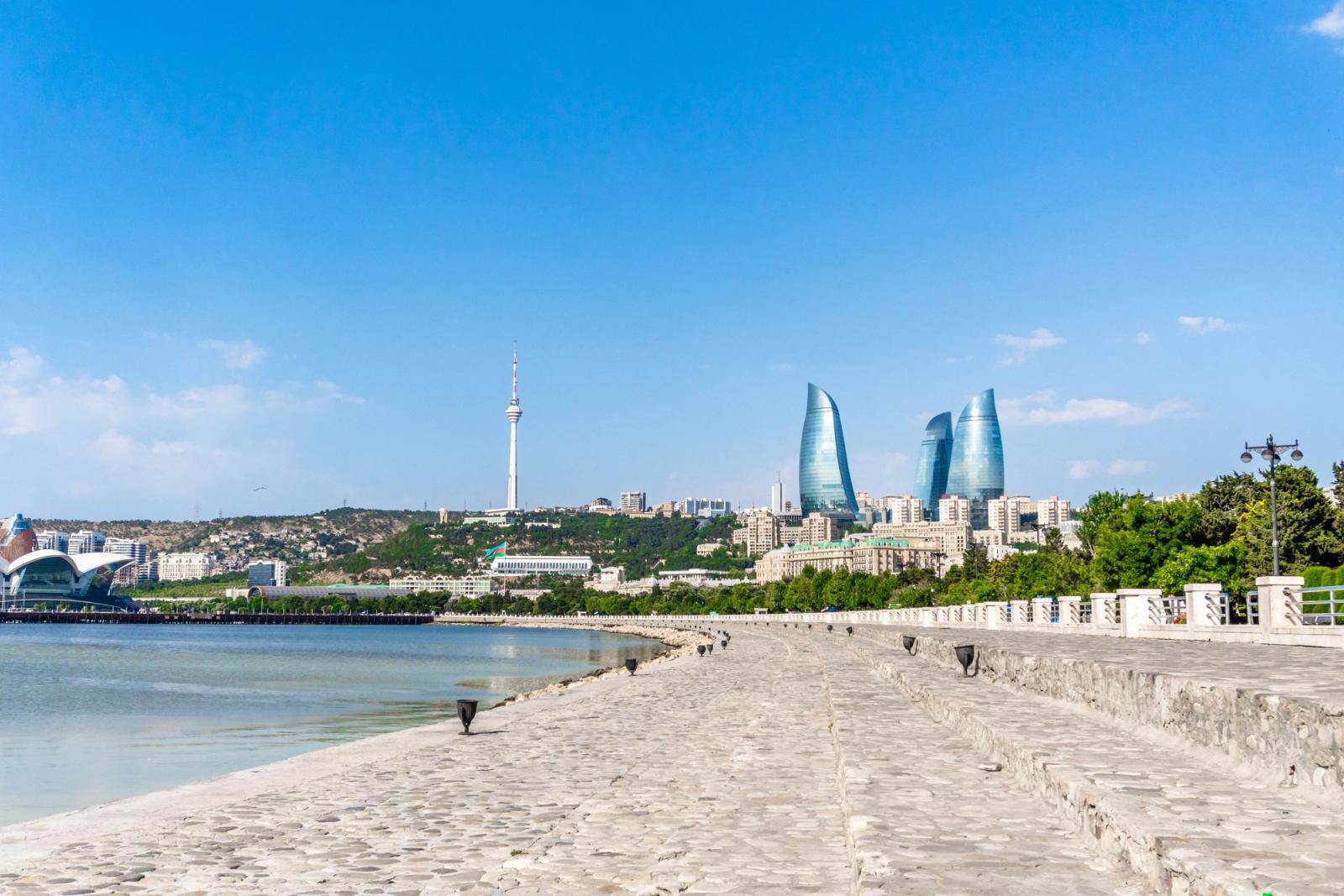 Beautiful landscape of Baku with the iconic Flame Towers and Caspian Sea waterfront