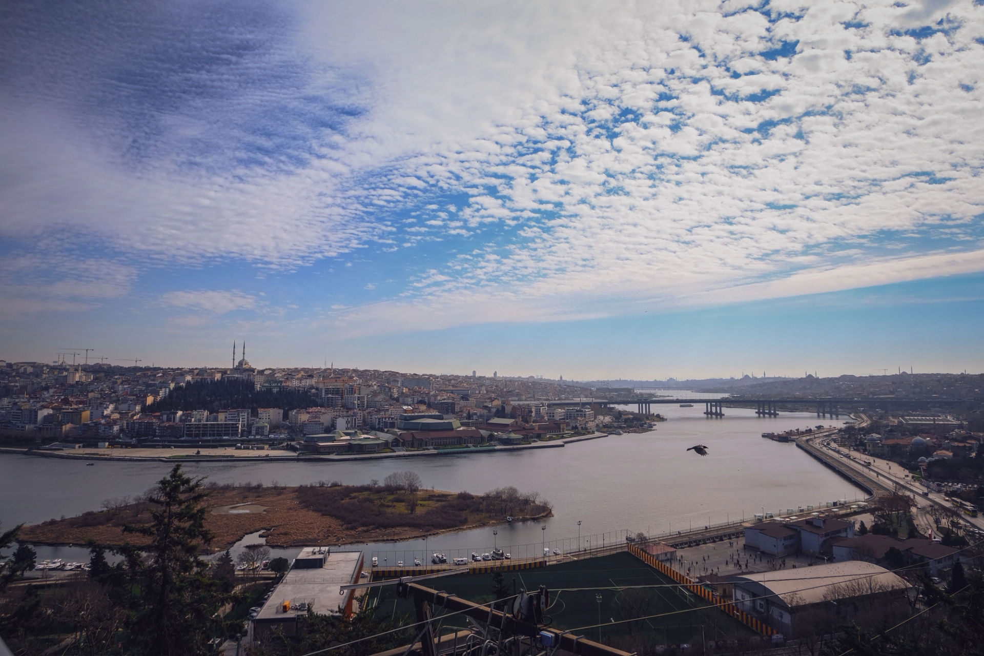 Stunning aerial view of Istanbul, featuring the Golden Horn and iconic skyline under a bright blue sky