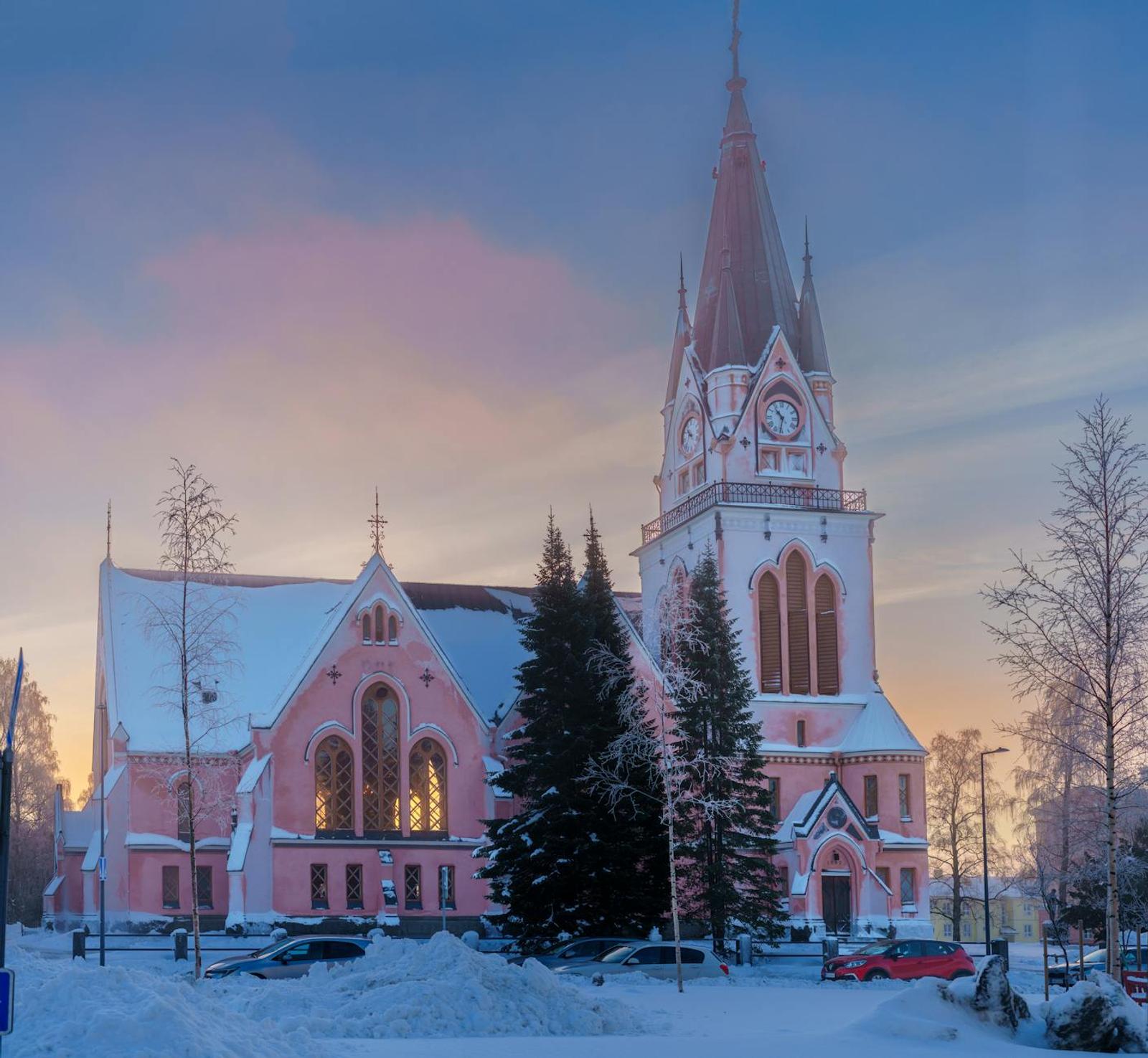 A stunning view of Kemi Church during a winter sunset in Lappi, Finland