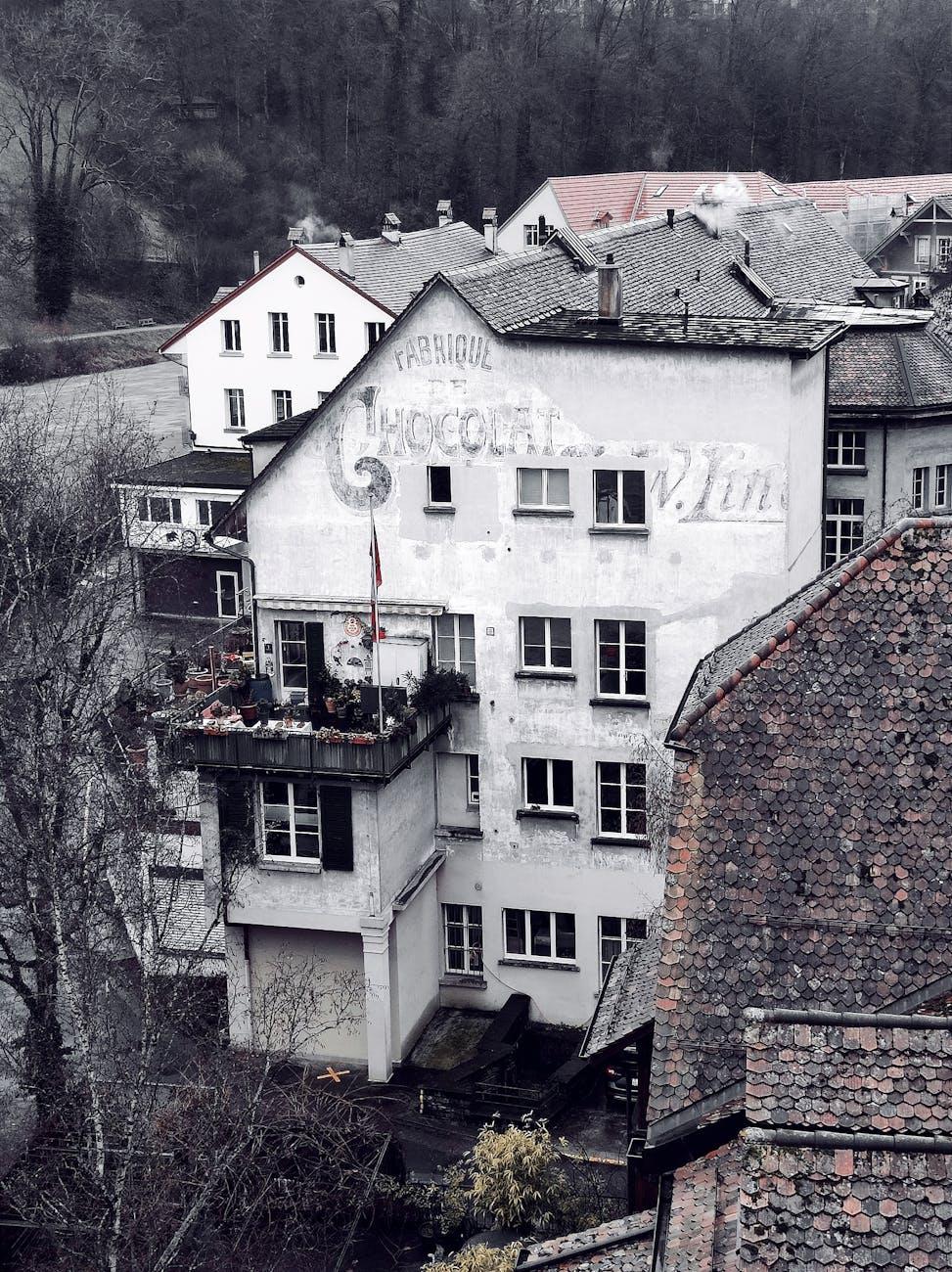 Aerial view of a historic building in Bern with vintage signage and classic Swiss architecture