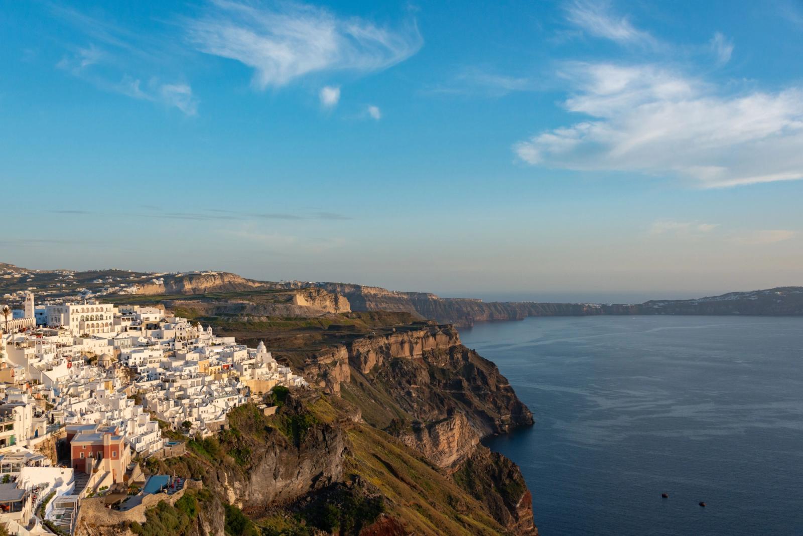 Breathtaking view of whitewashed buildings overlooking the Aegean Sea in Santorini, Greece
