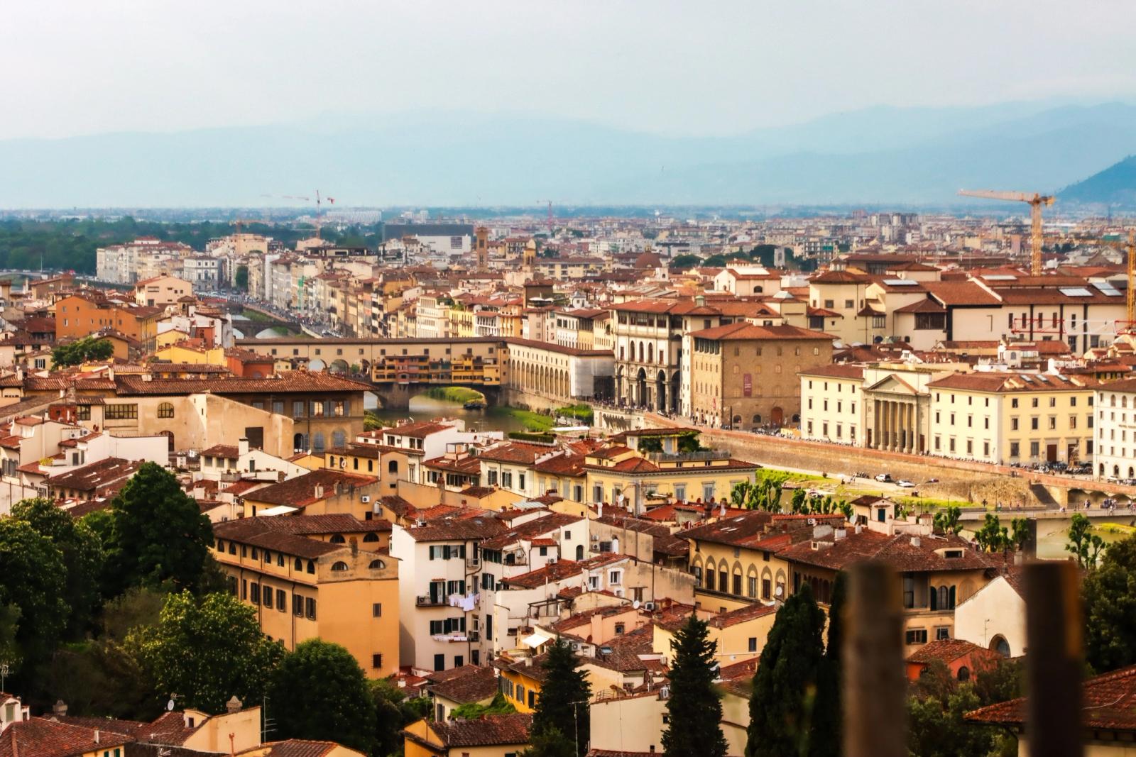 Panoramic view of Florence cityscape, showcasing historic architecture and the Arno River in Tuscany, Italy