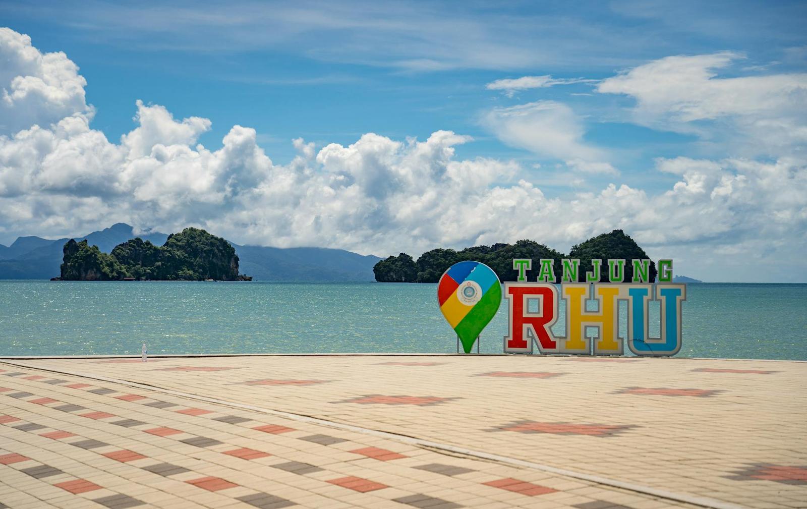 Breathtaking view of Tanjung Rhu beach in Langkawi, Malaysia with blue skies and sea