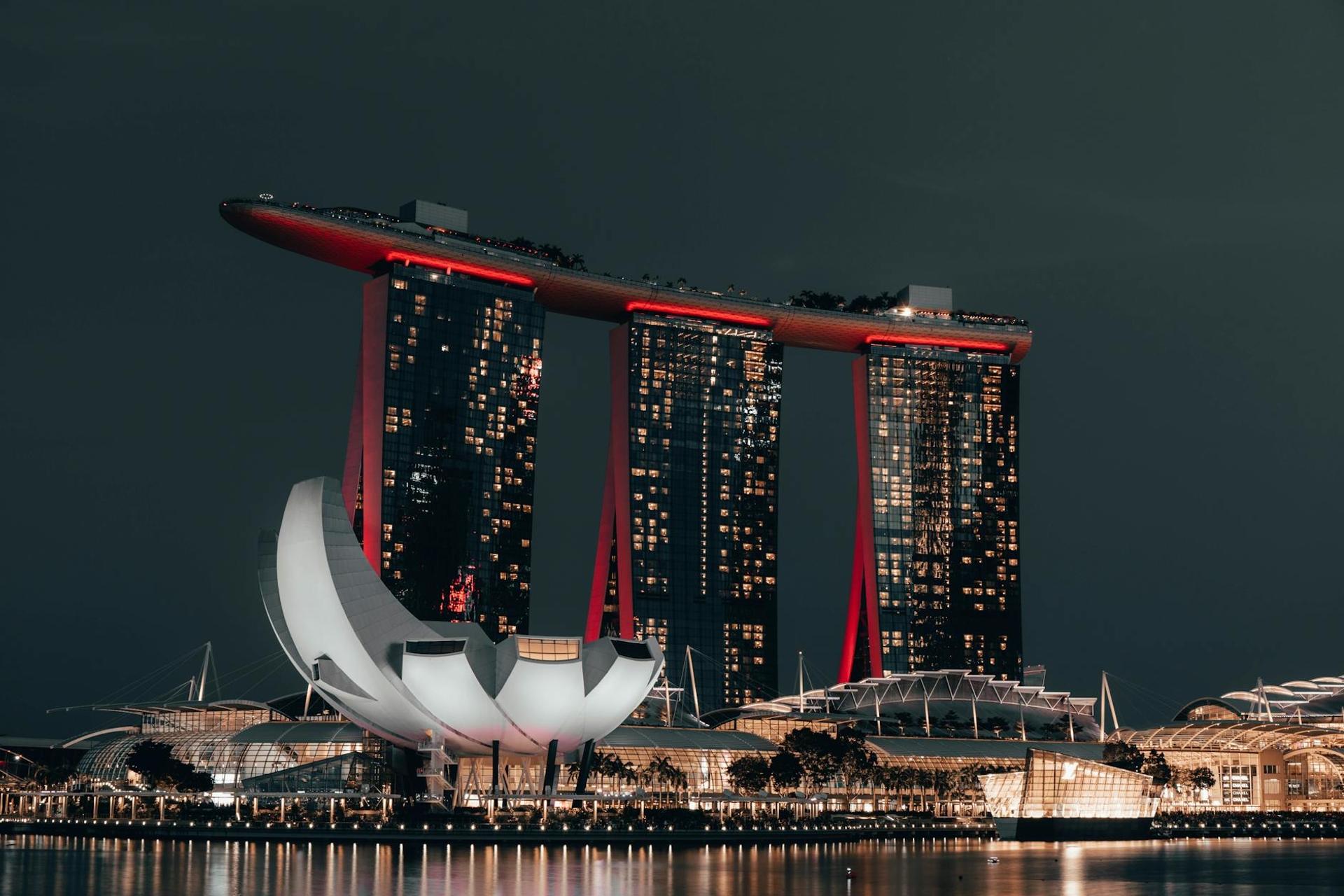 Marina Bay Sands lit up against the night skyline