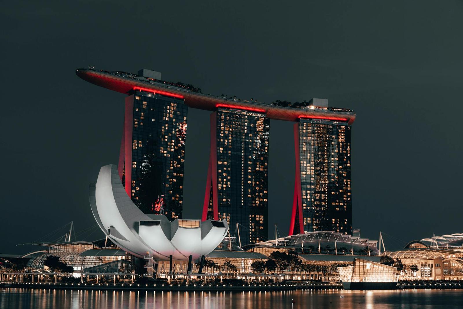 Marina Bay Sands lit up against the night skyline