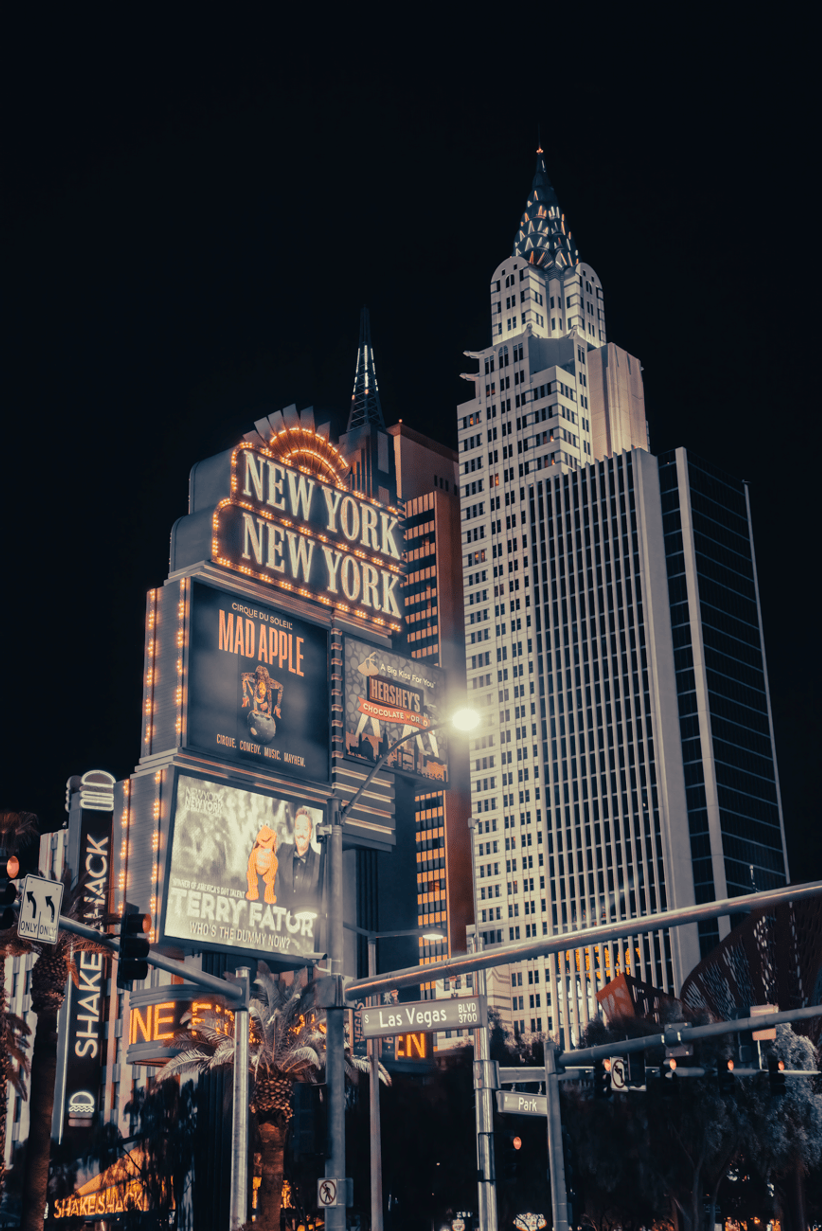 Illuminated New York New York casino sign against a night sky