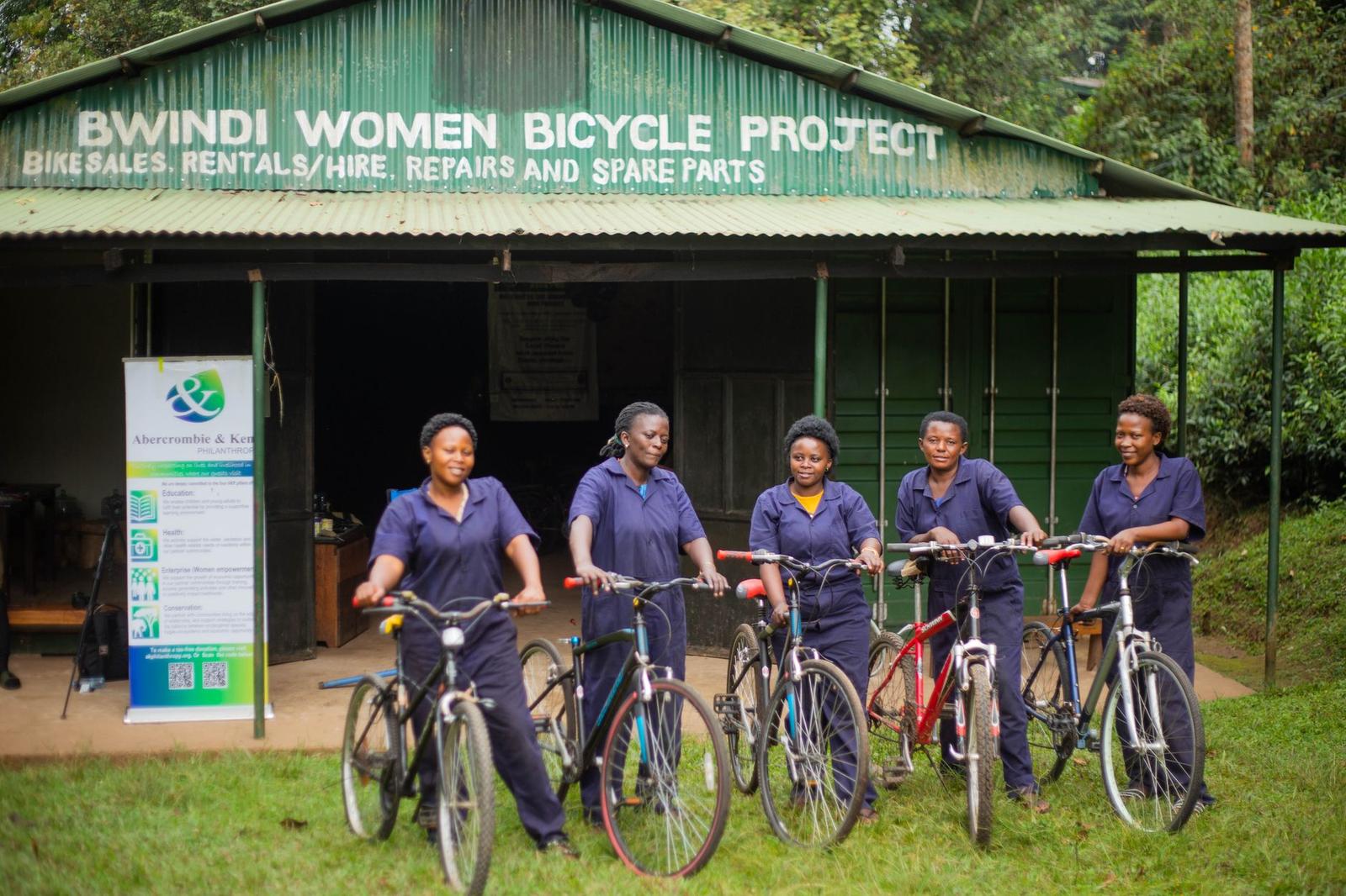 Women from the Bwindi Bicycle Project pose with bicycles, promoting local empowerment