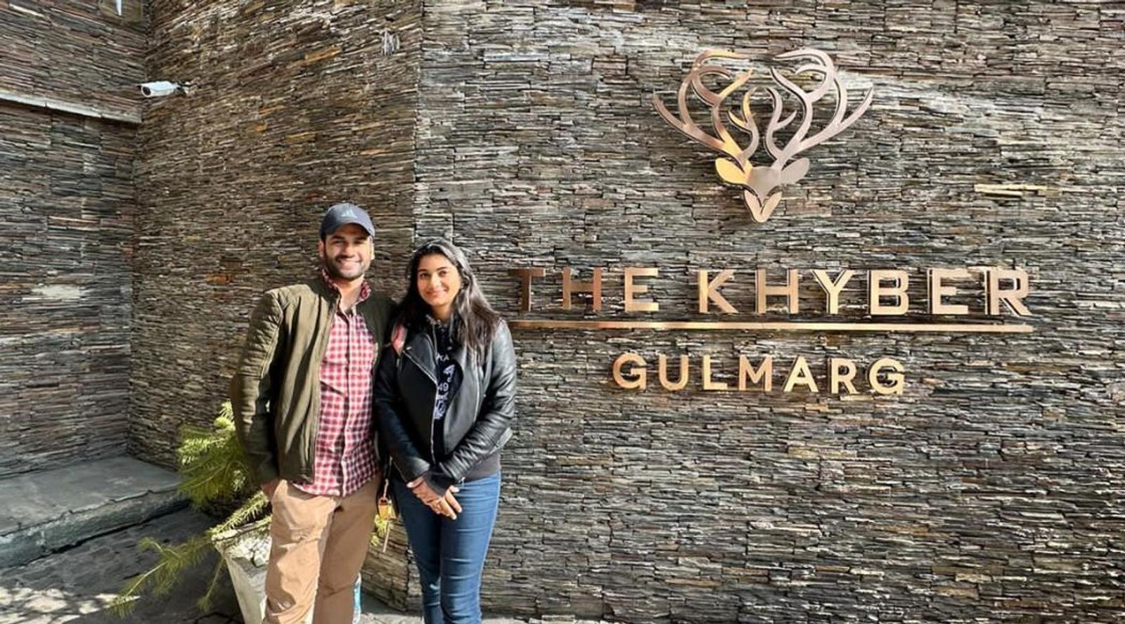 Couple posing at The Khyber Resort, Gulmarg entrance.