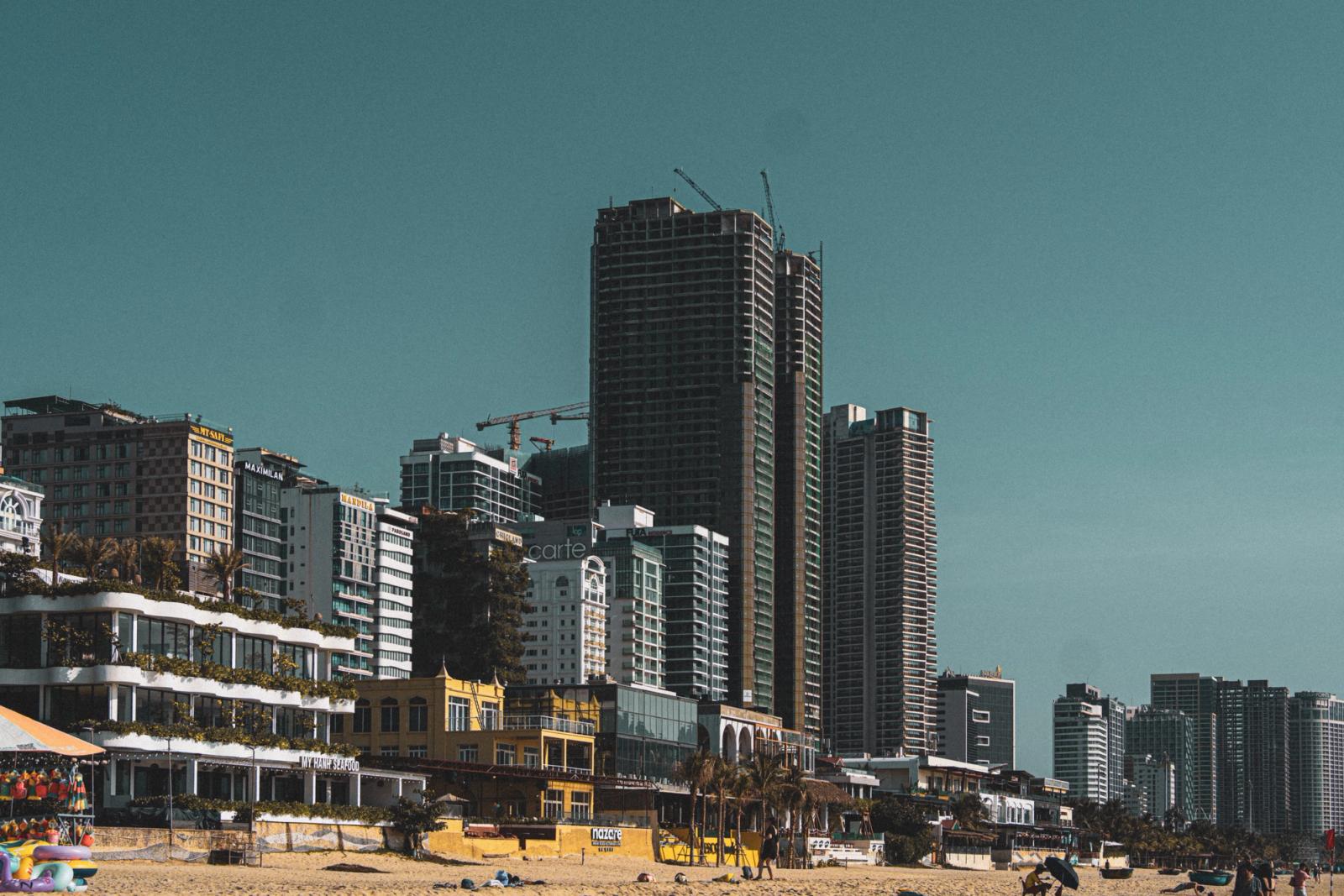 Urban skyline of Da Nang, Vietnam with high-rise buildings along the beachfront, showcasing modern architecture