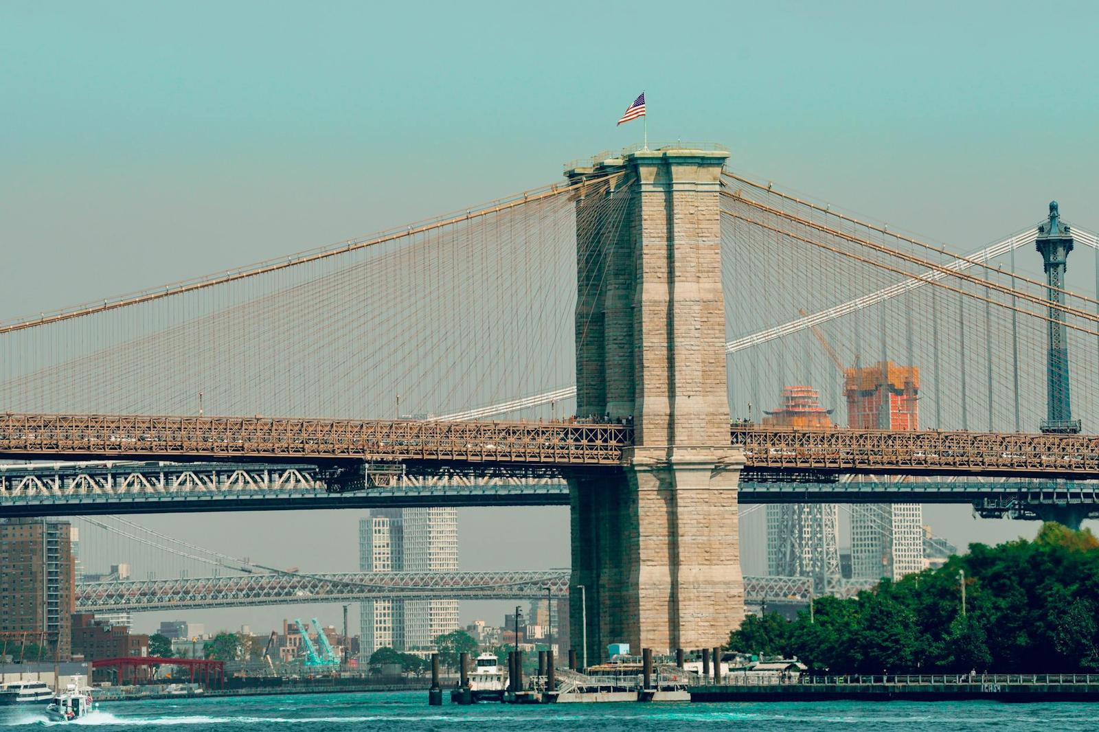 Scenic view of the iconic Brooklyn Bridge with New York City skyline in the background