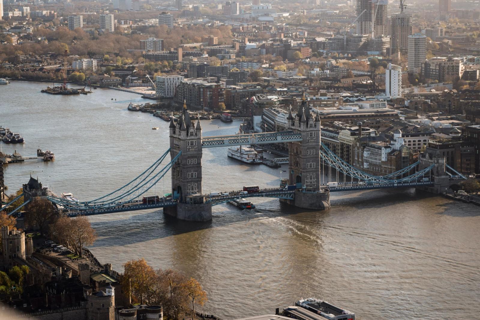 Aerial view of the iconic Tower Bridge spanning the River Thames in London, UK