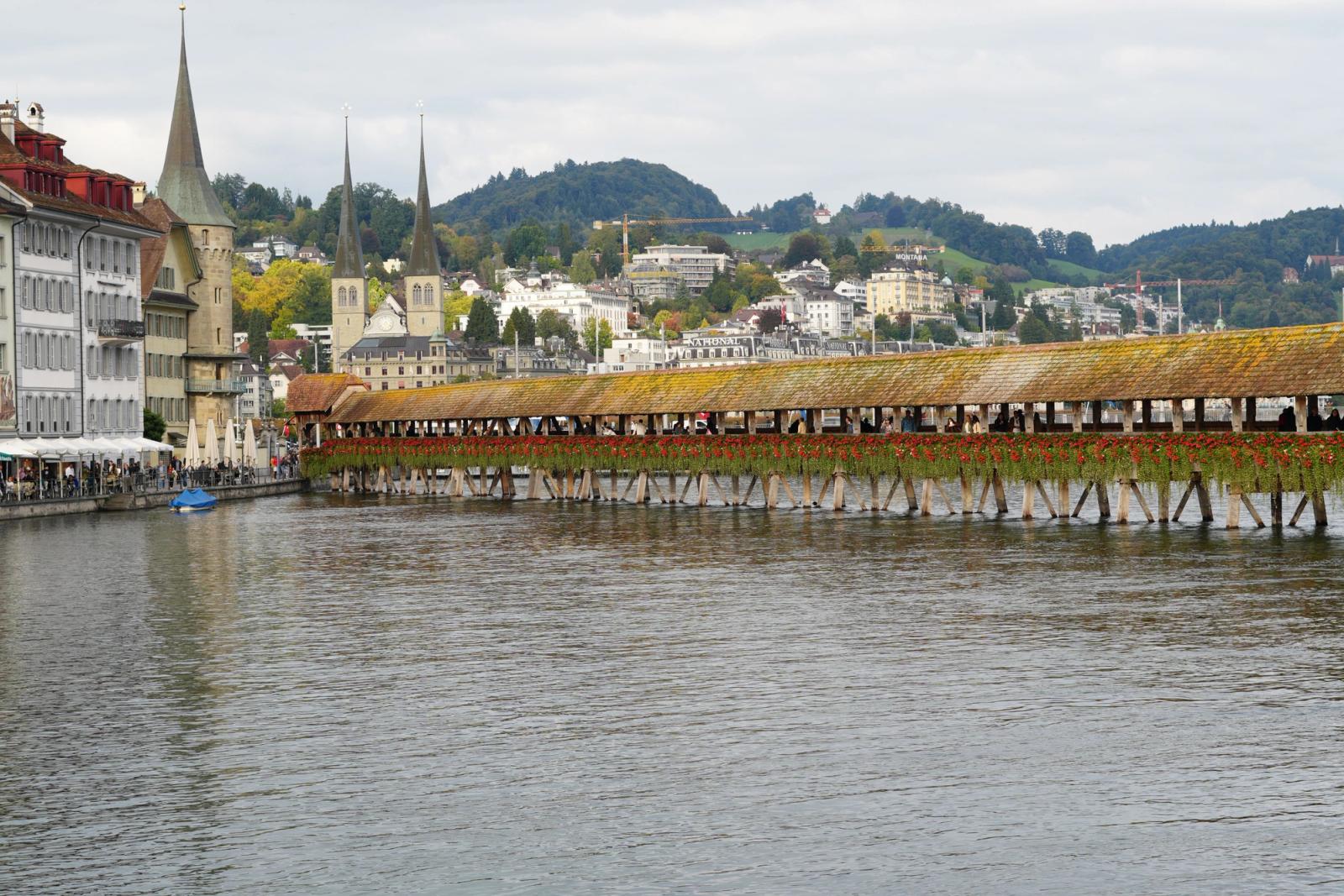 Beautiful shot of Chapel Bridge over the Reuss River in Lucerne, Switzerland, showcasing iconic architecture