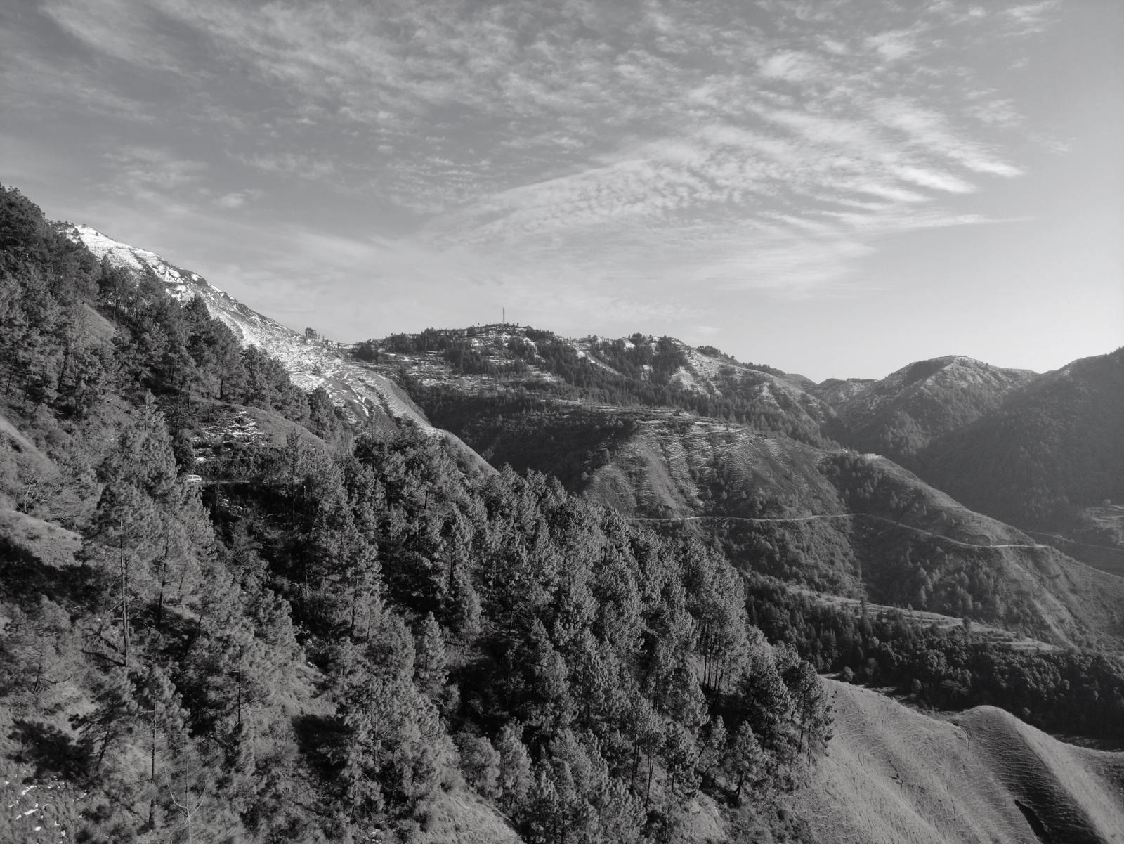 Captivating black and white view of the Himalayan mountains in Dehradun, India, capturing nature's serene beauty