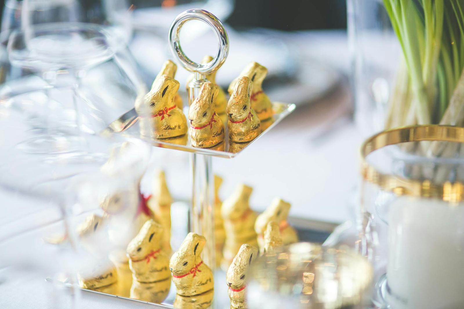 Luxury Easter chocolate bunny arrangement in a festive table setting
