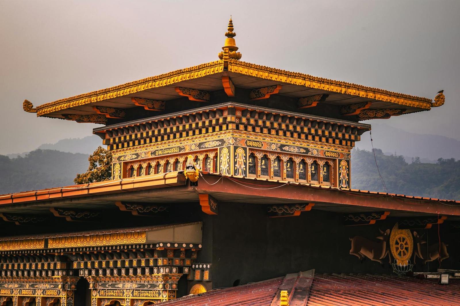 Explore the intricate design and serene atmosphere of a Bhutanese temple in Phuentsholing, Bhutan