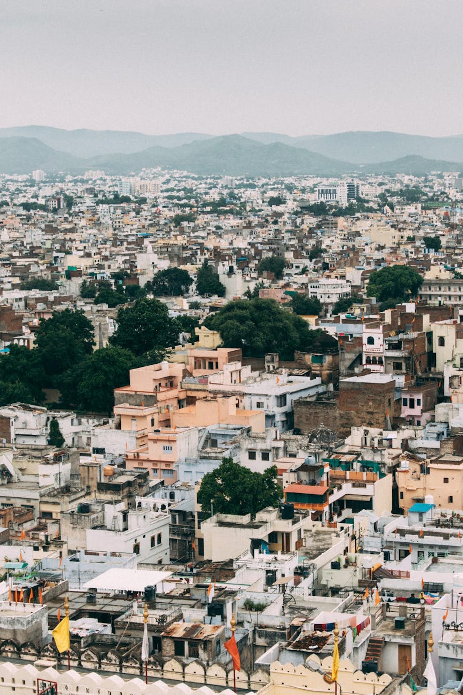 Stunning aerial view of the dense cityscape and vibrant buildings of Udaipur, India