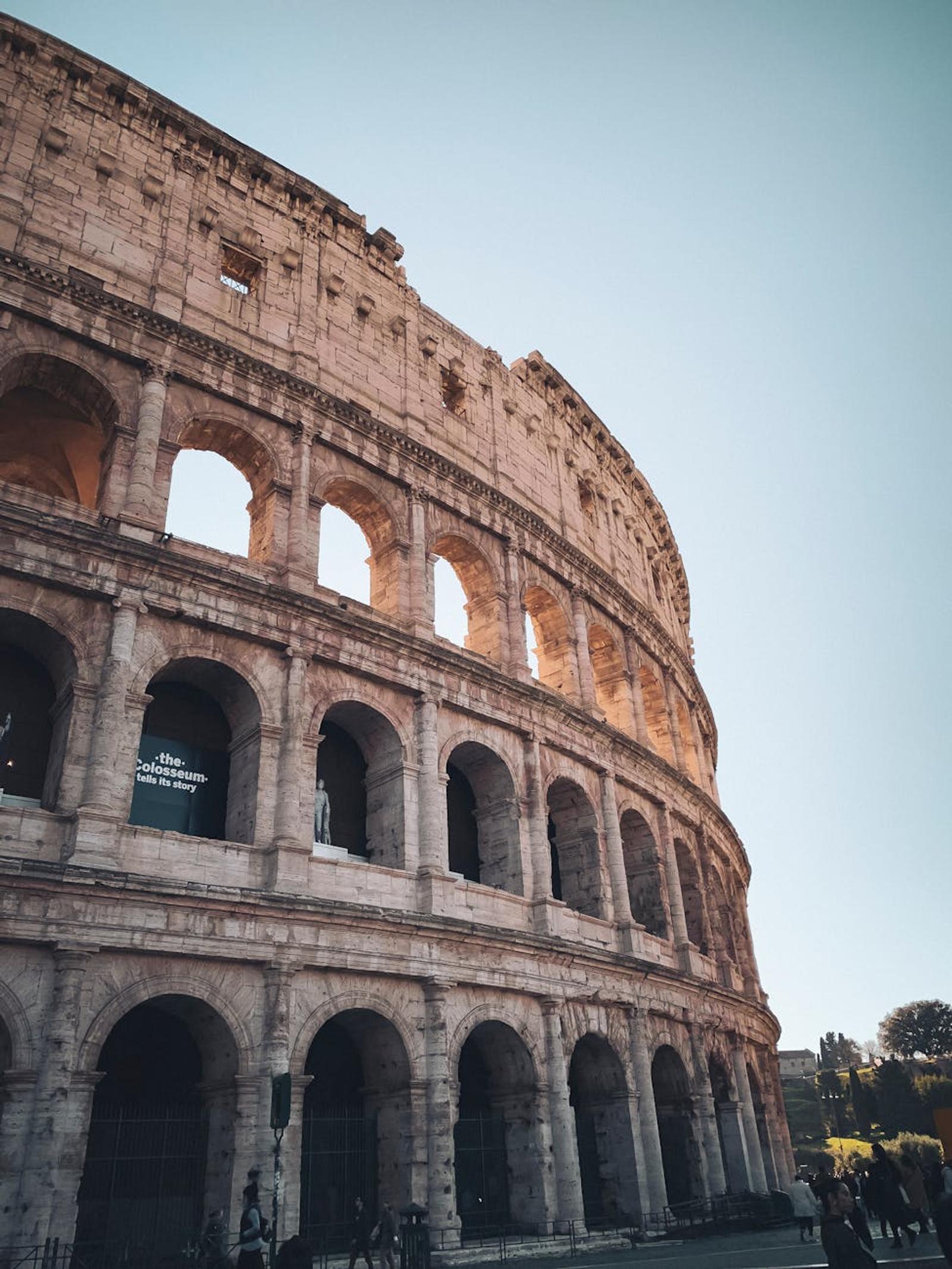 Stunning view of the historic Colosseum in Rome under a clear sky