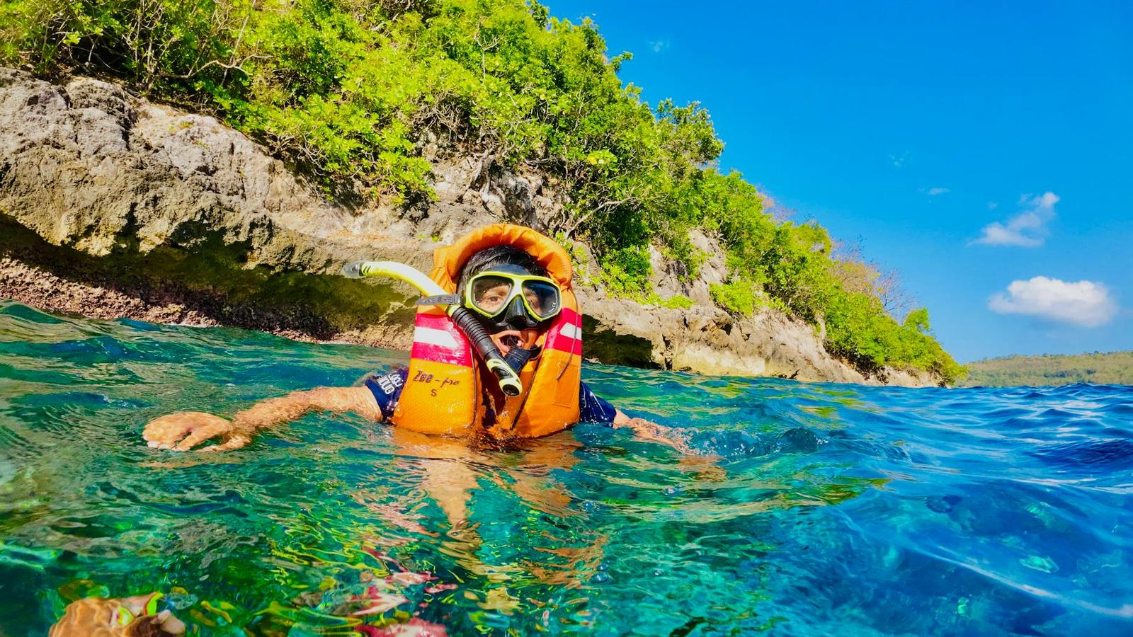 Explore snorkeling in Bali with vibrant coral reefs and crystal clear waters