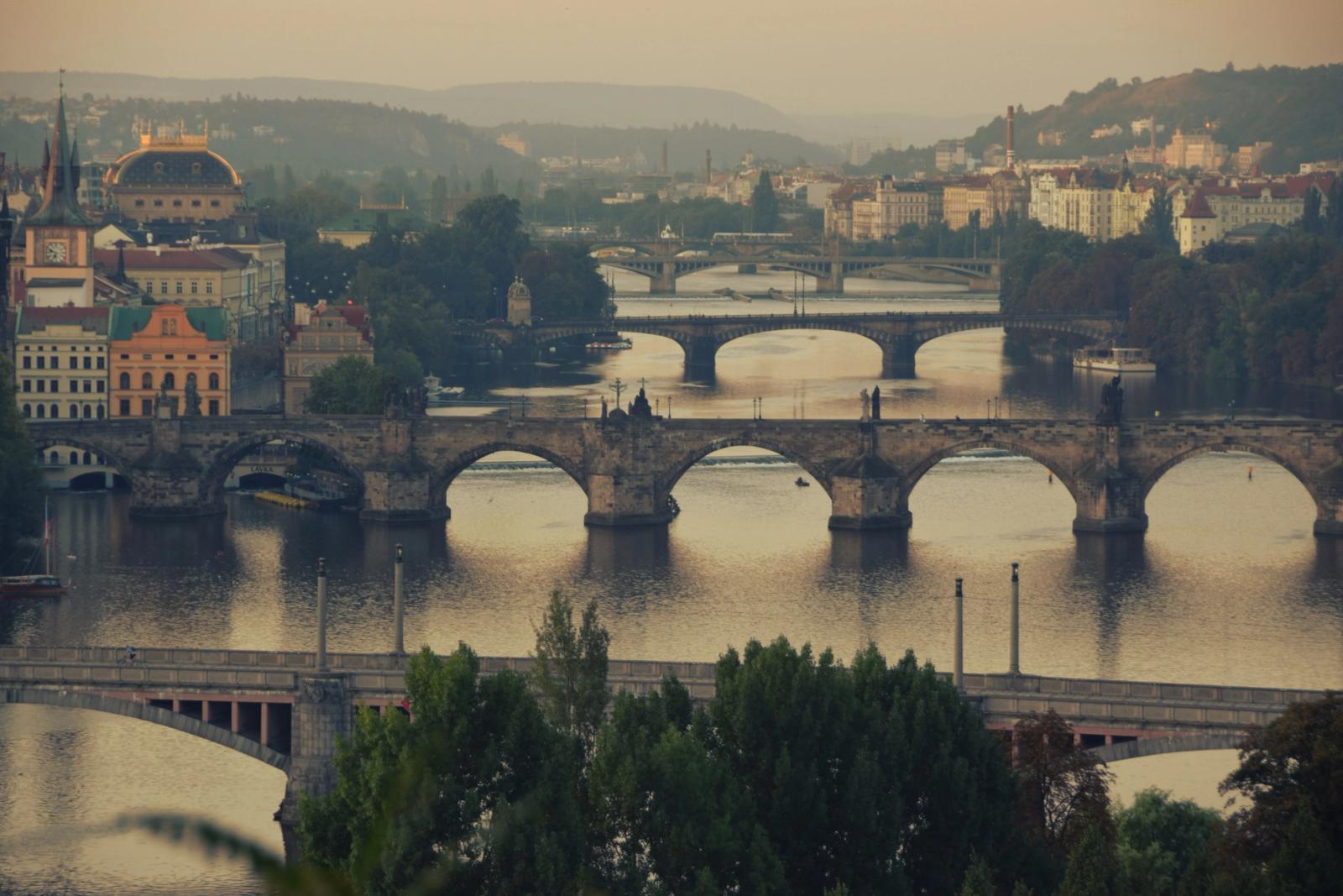 Captivating view of Prague's bridges and cityscape during an overcast day