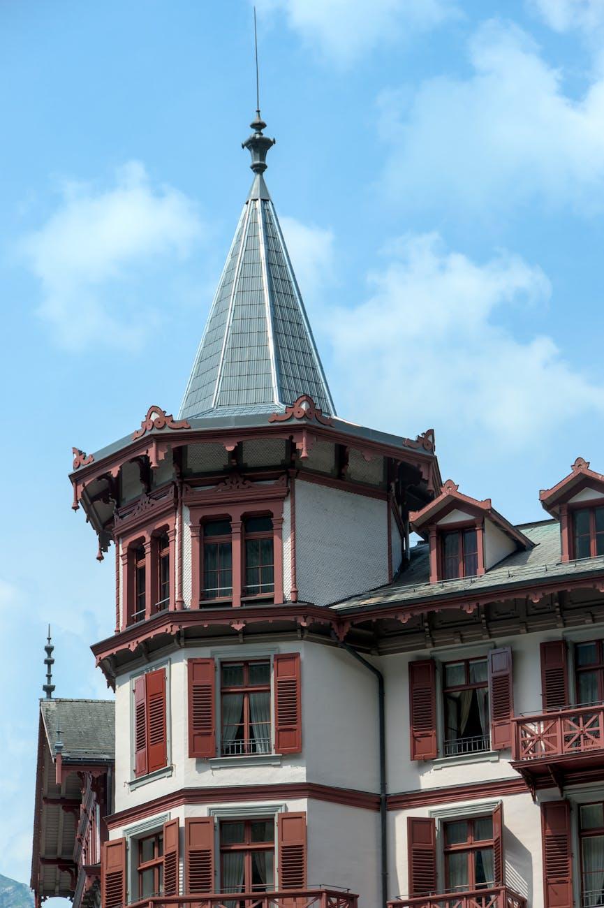 Close-up of a historic hotel's tower and facade in Brienz, Switzerland