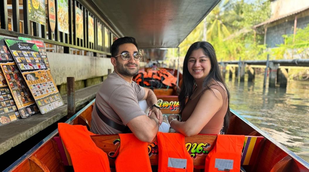 A couple enjoying a boat riding