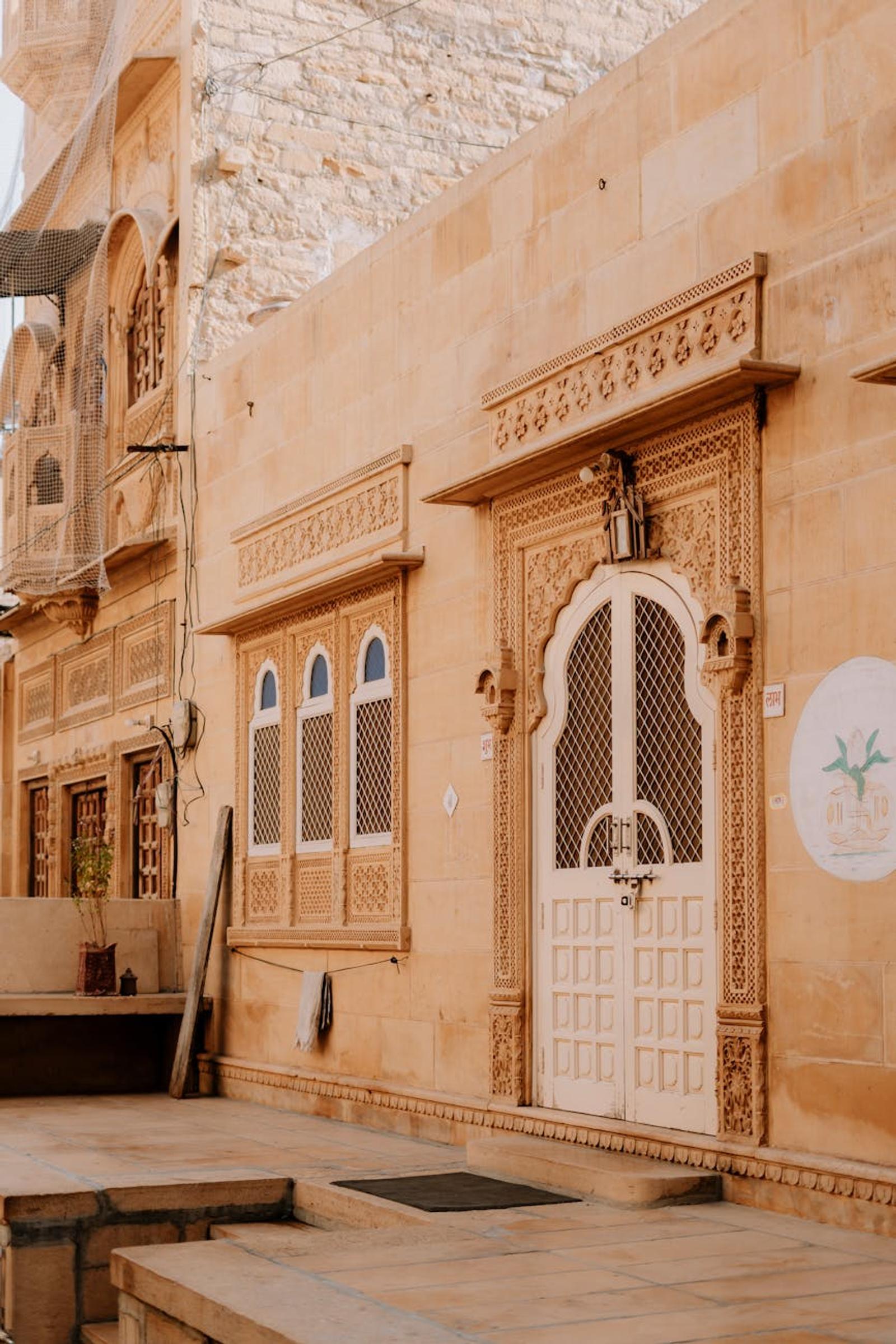 Explore the ornate architectural details of a traditional building in Jaisalmer