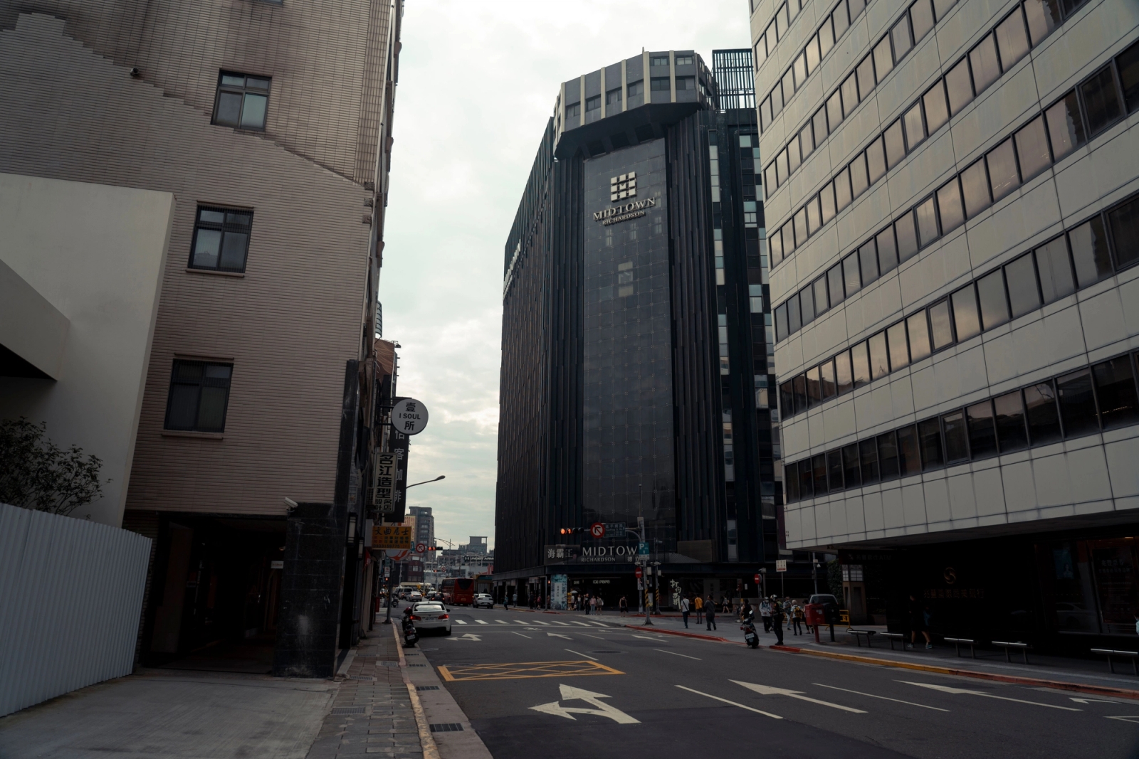 View of modern skyscrapers in Taipei's urban downtown district with street scene