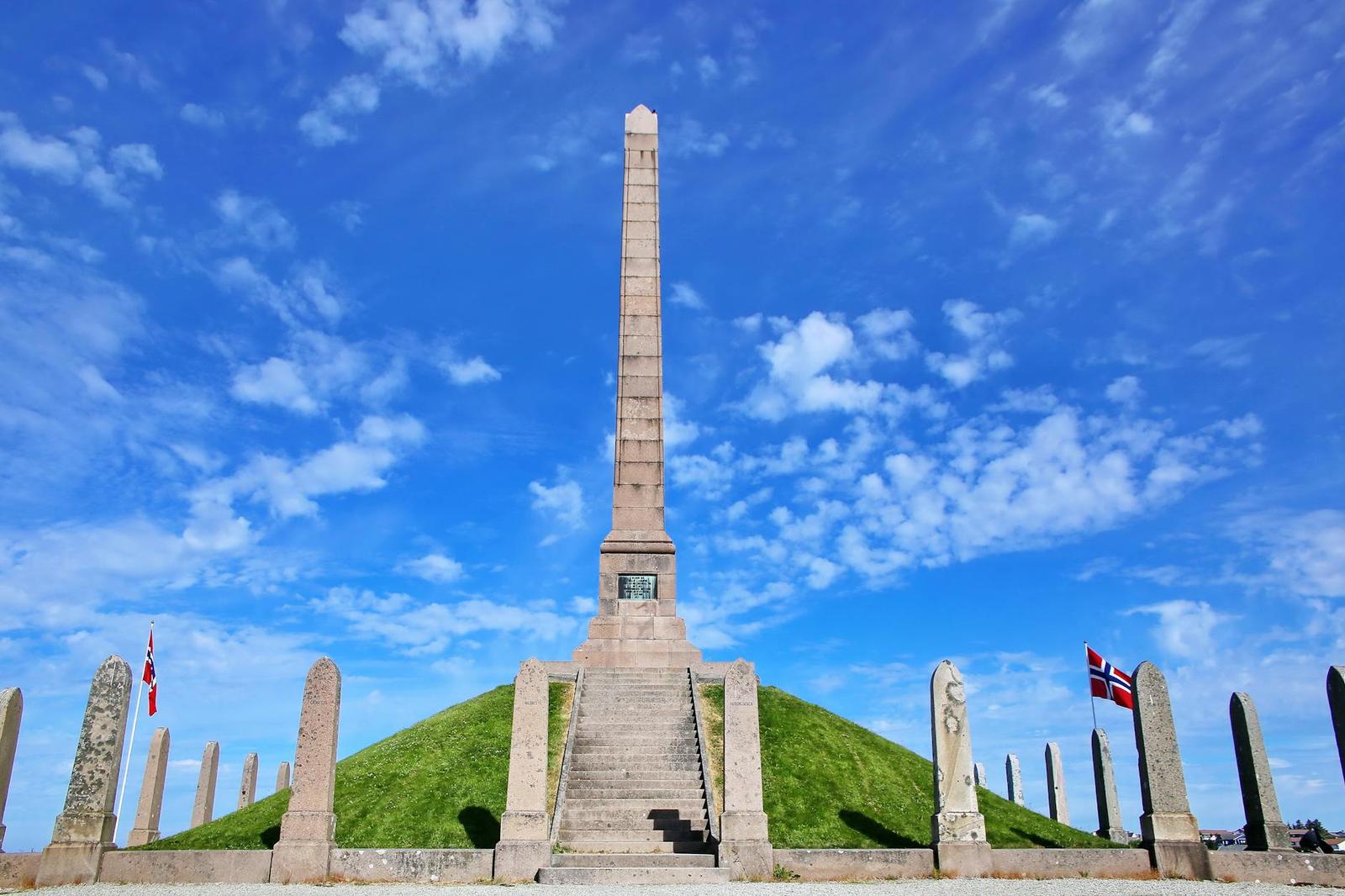 Stunning view of the Haraldshaugen monument under a clear blue sky in Haugesund, Norway