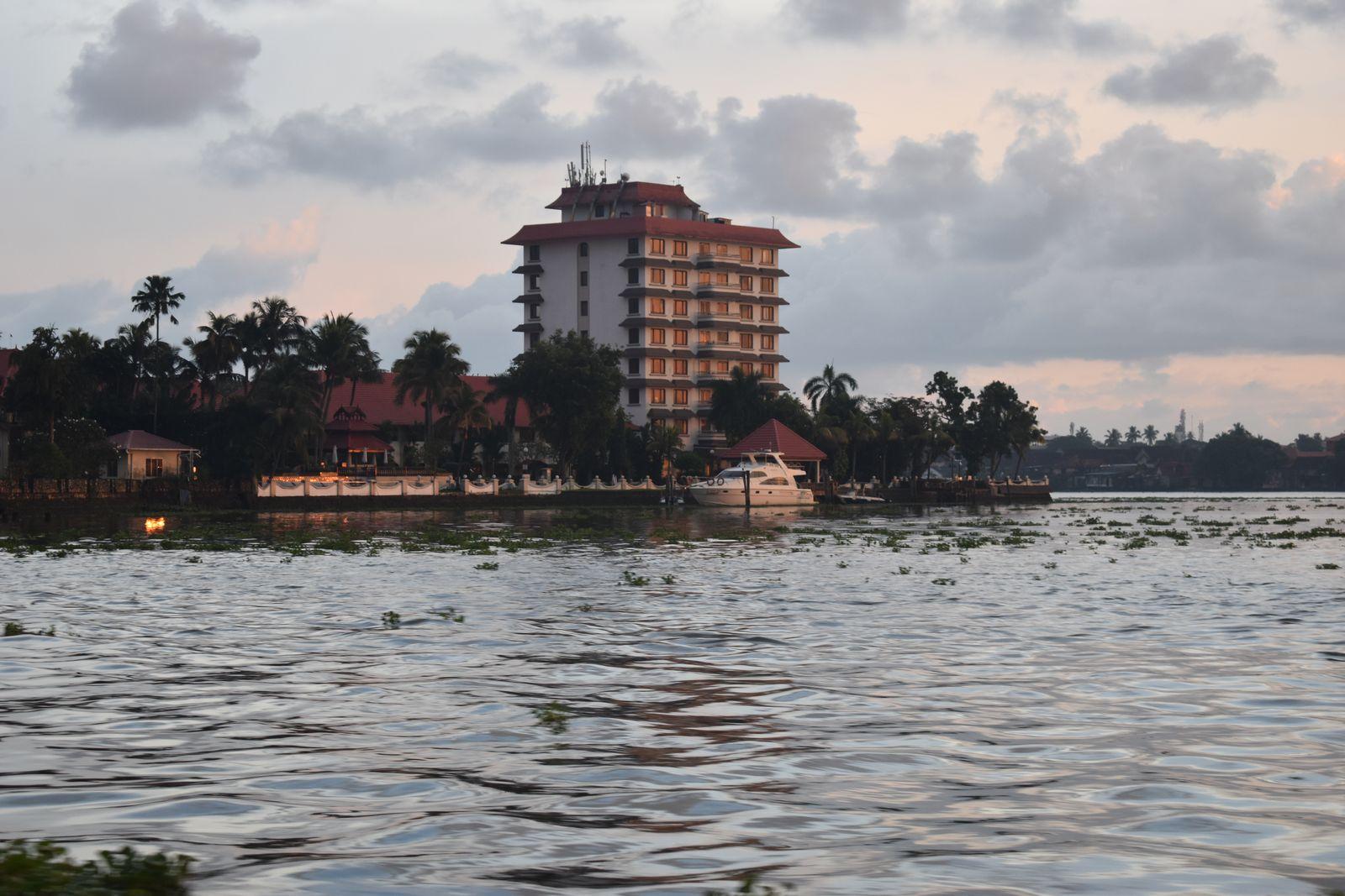 A waterfront hotel on the Kochi backwaters at dusk