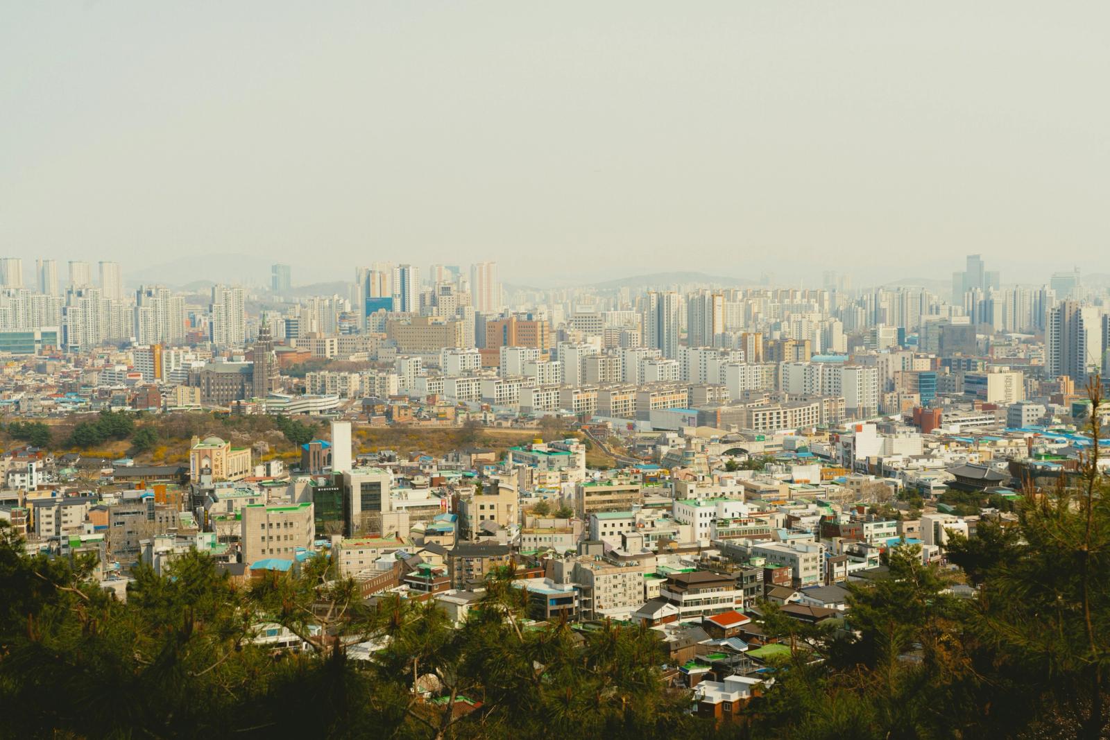Aerial view of Seoul, South Korea showcasing urban cityscape and high-rise buildings on a clear day