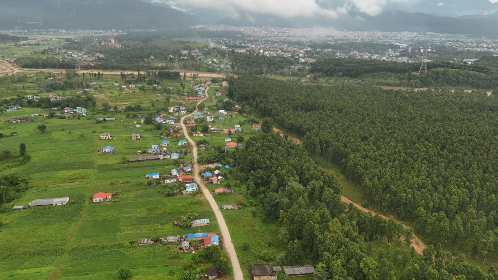 Scenic aerial view of rural Nepal with lush greenery and small villages
