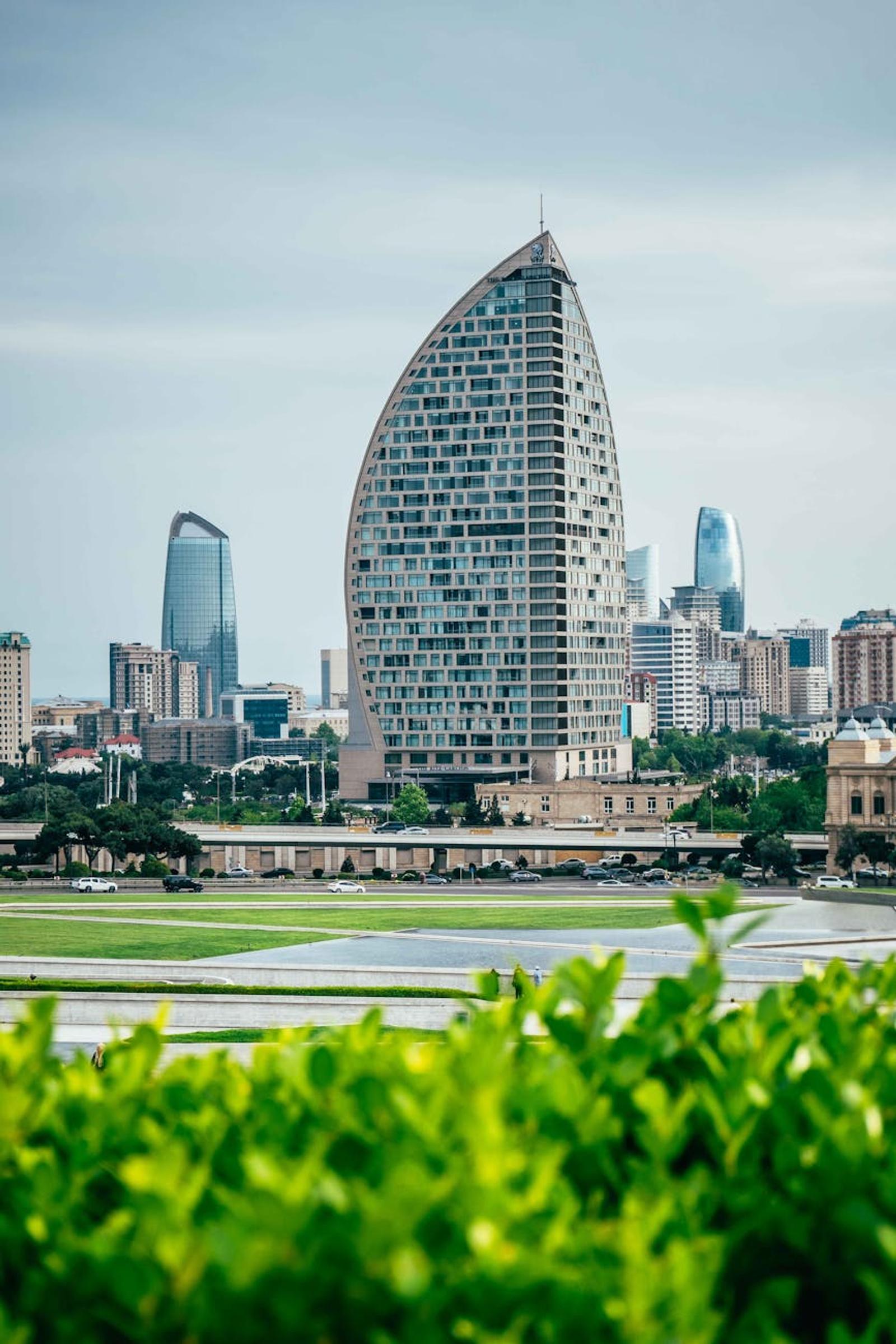 View of the iconic Crescent-shaped building in Baku, Azerbaijan skyline