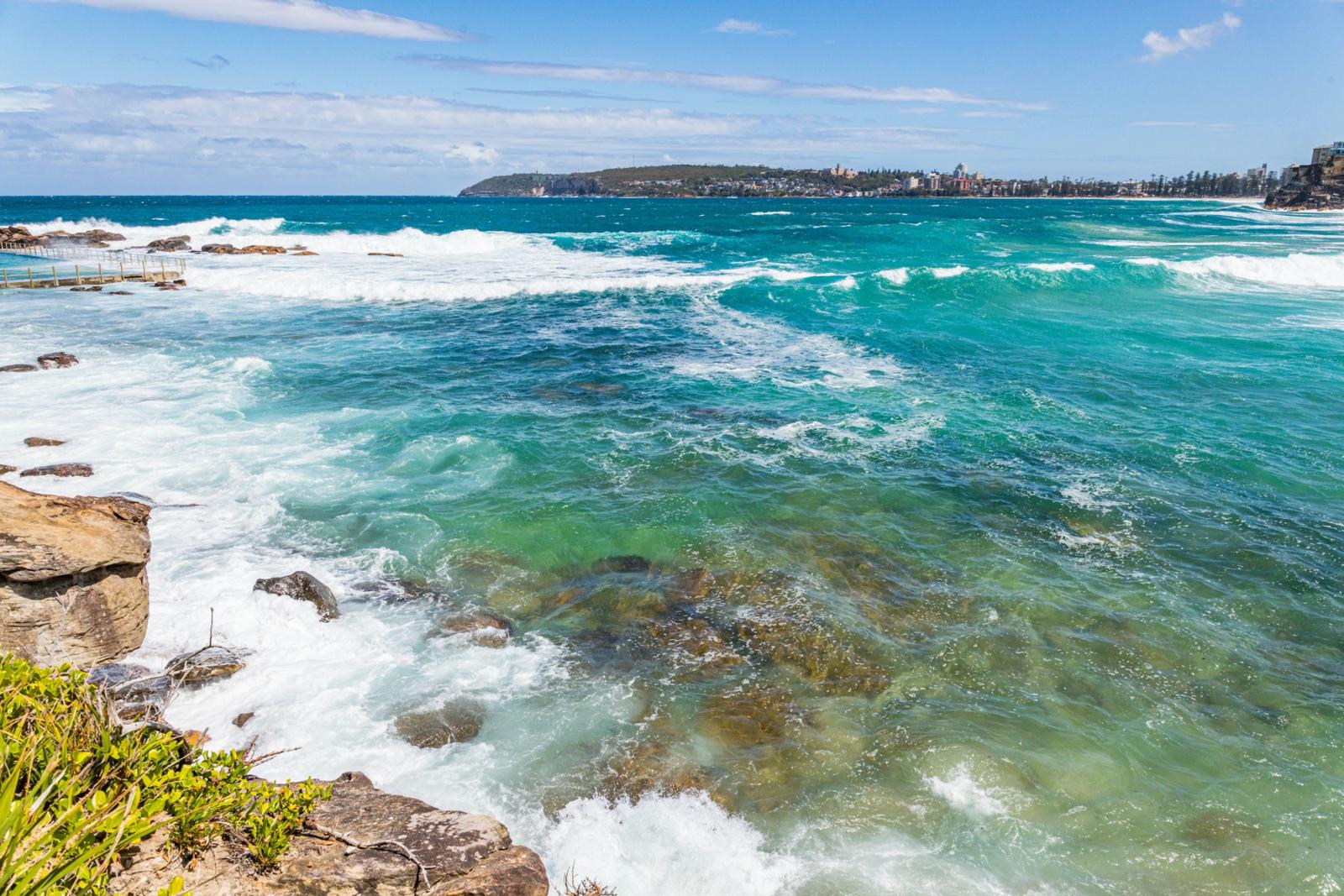 Beautiful waves and turquoise waters at Freshwater Beach, NSW, Australia