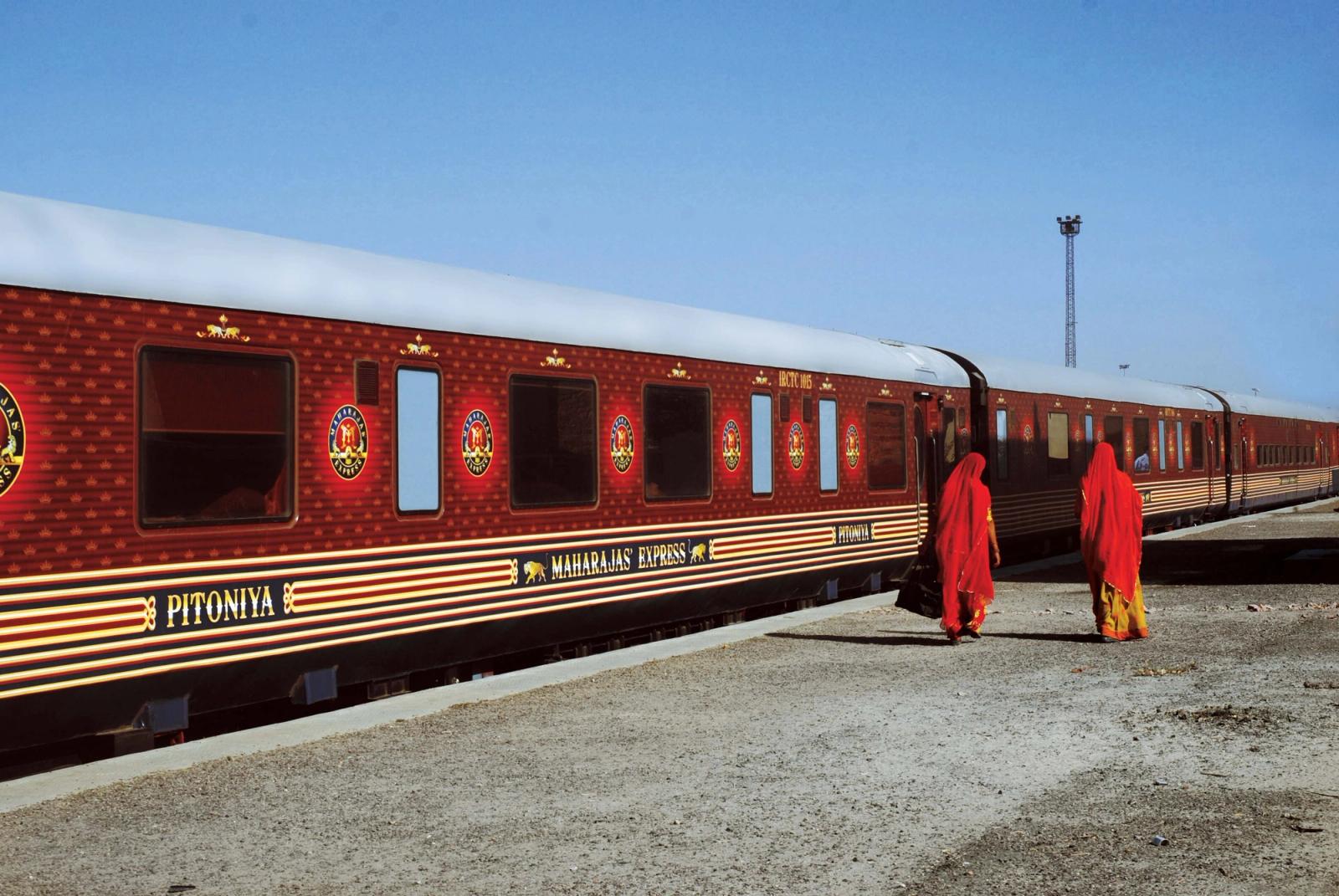 Maharajas' Express maroon coaches at the platform