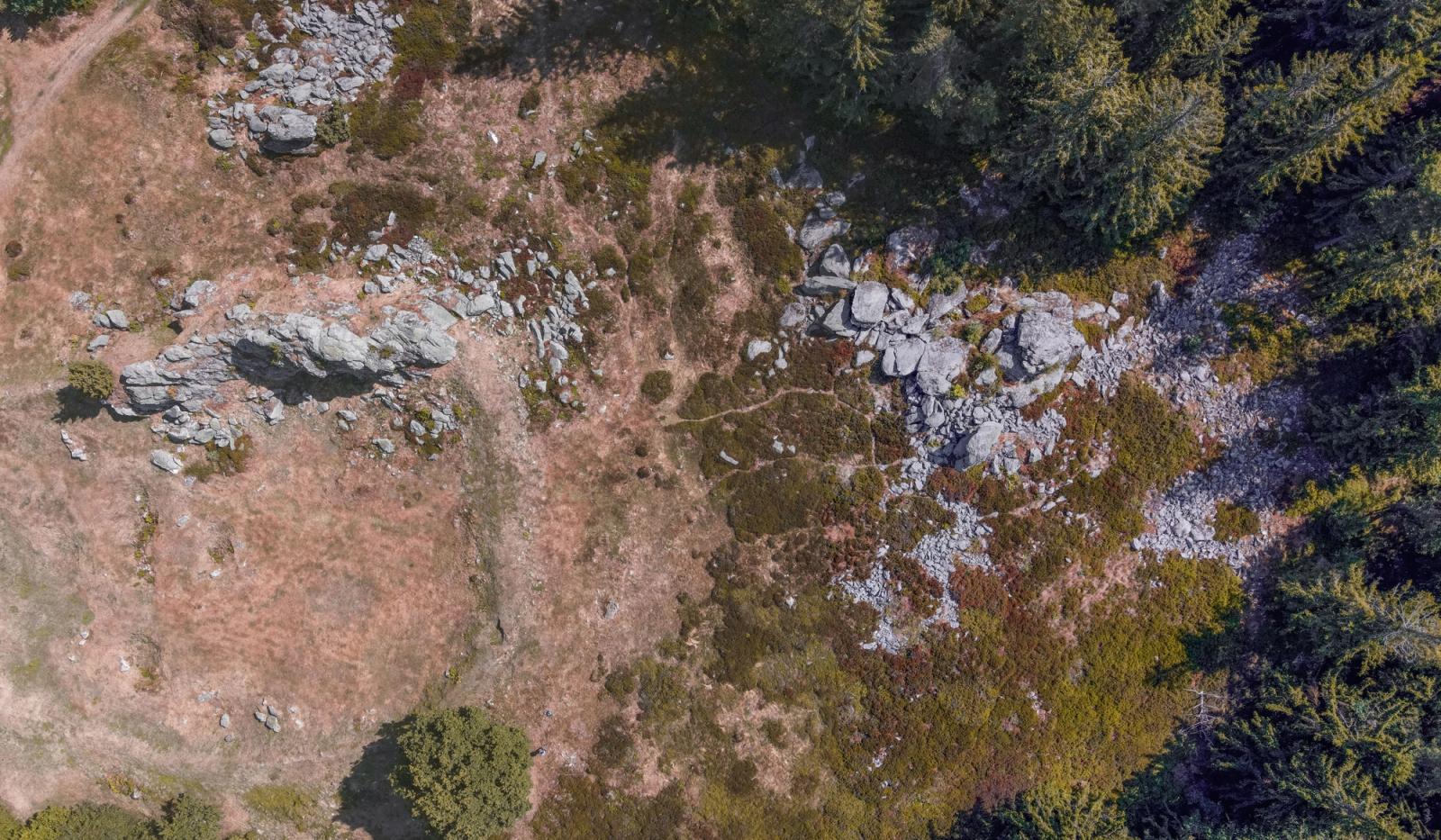 Drone shot of scenic rock formations and forest in Teunz, Germany