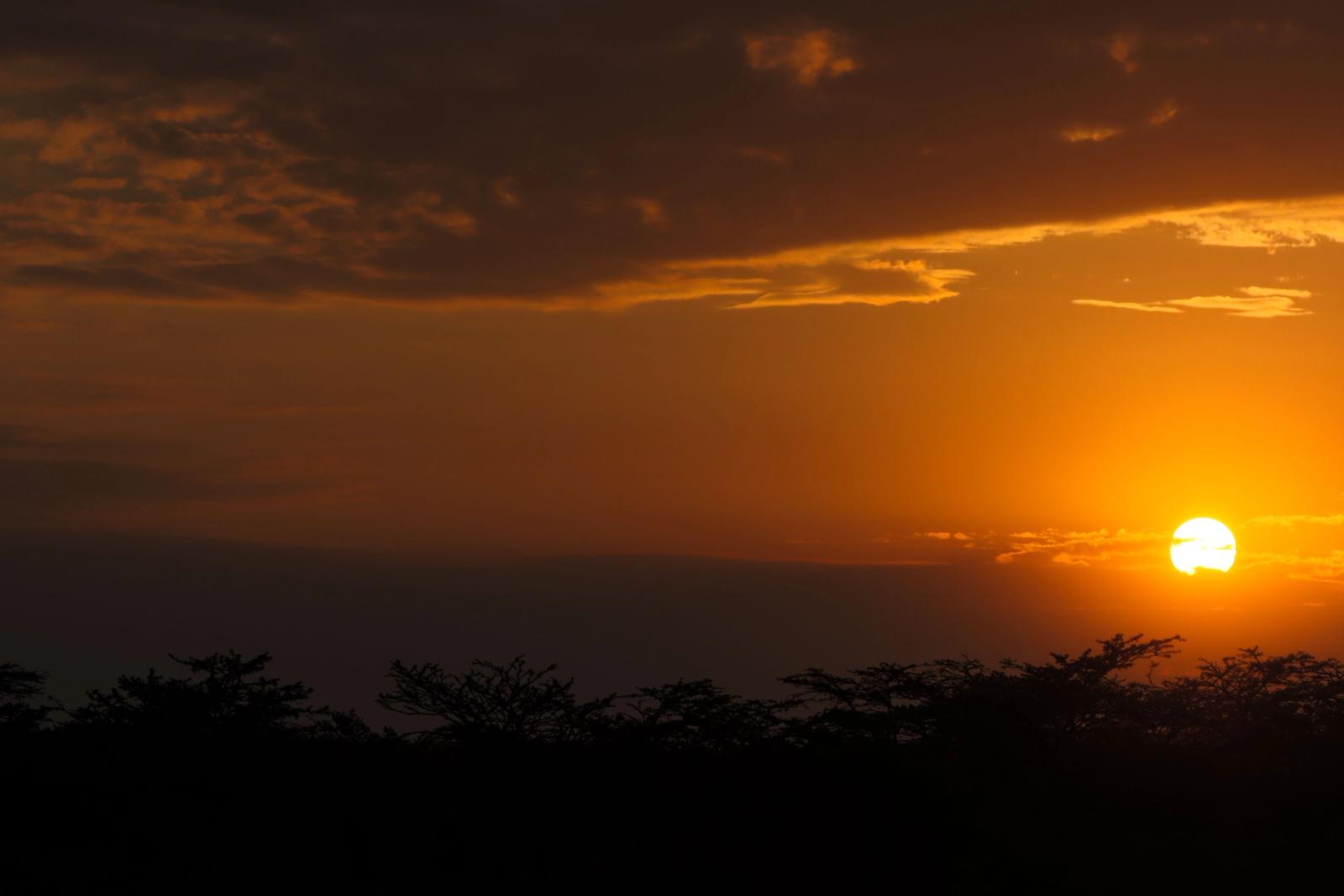 Stunning sunset with vibrant colors over the African landscape in Nakuru, Kenya showcasing nature's beauty