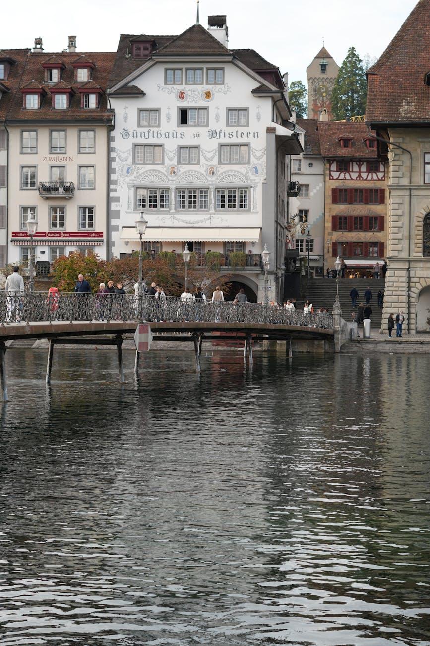 Charming view of the historic Kapellbrücke and waterfront buildings in Lucerne, Switzerland