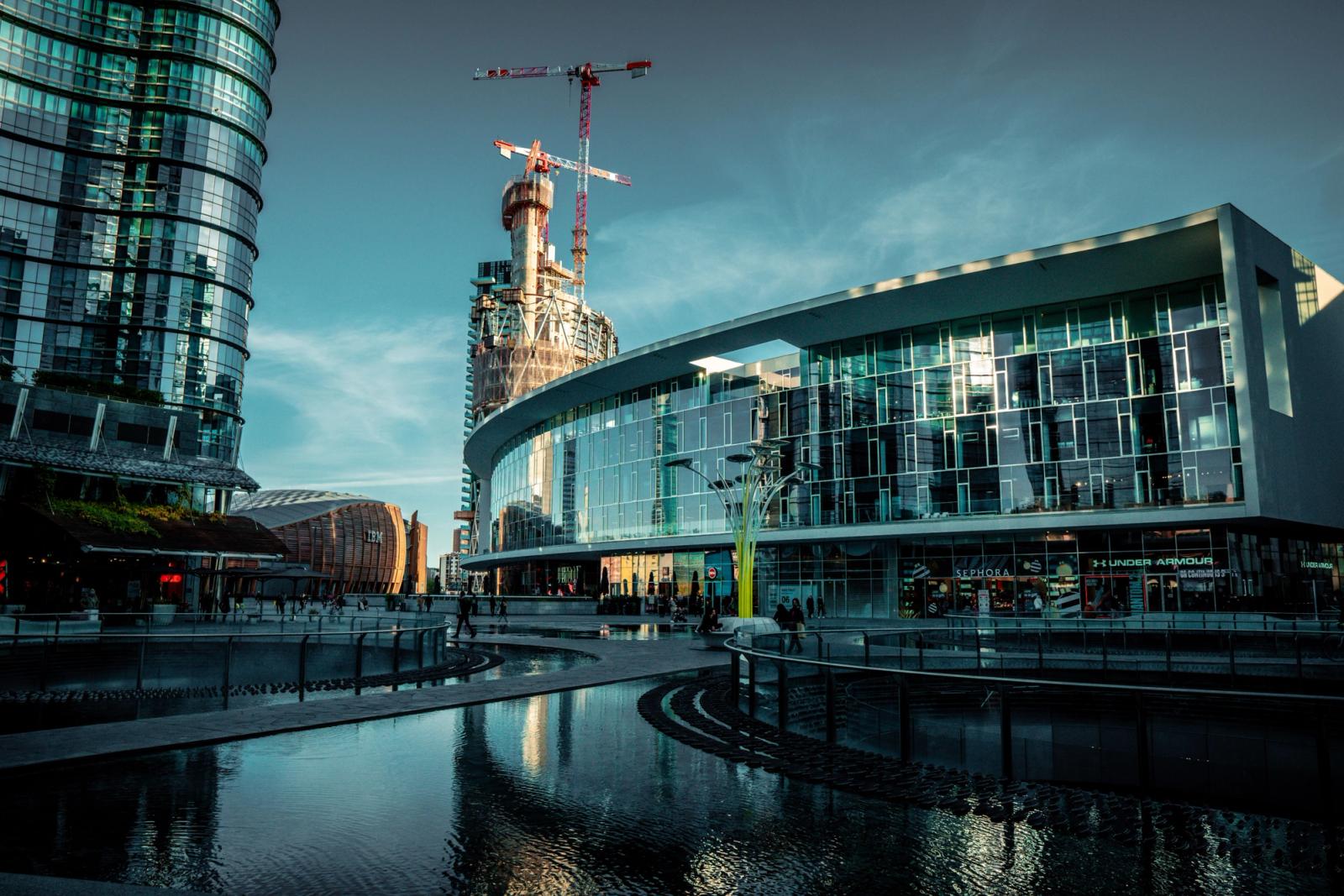Explore the stunning modern architecture in Milan's Porta Nuova district with skyscrapers and urban views