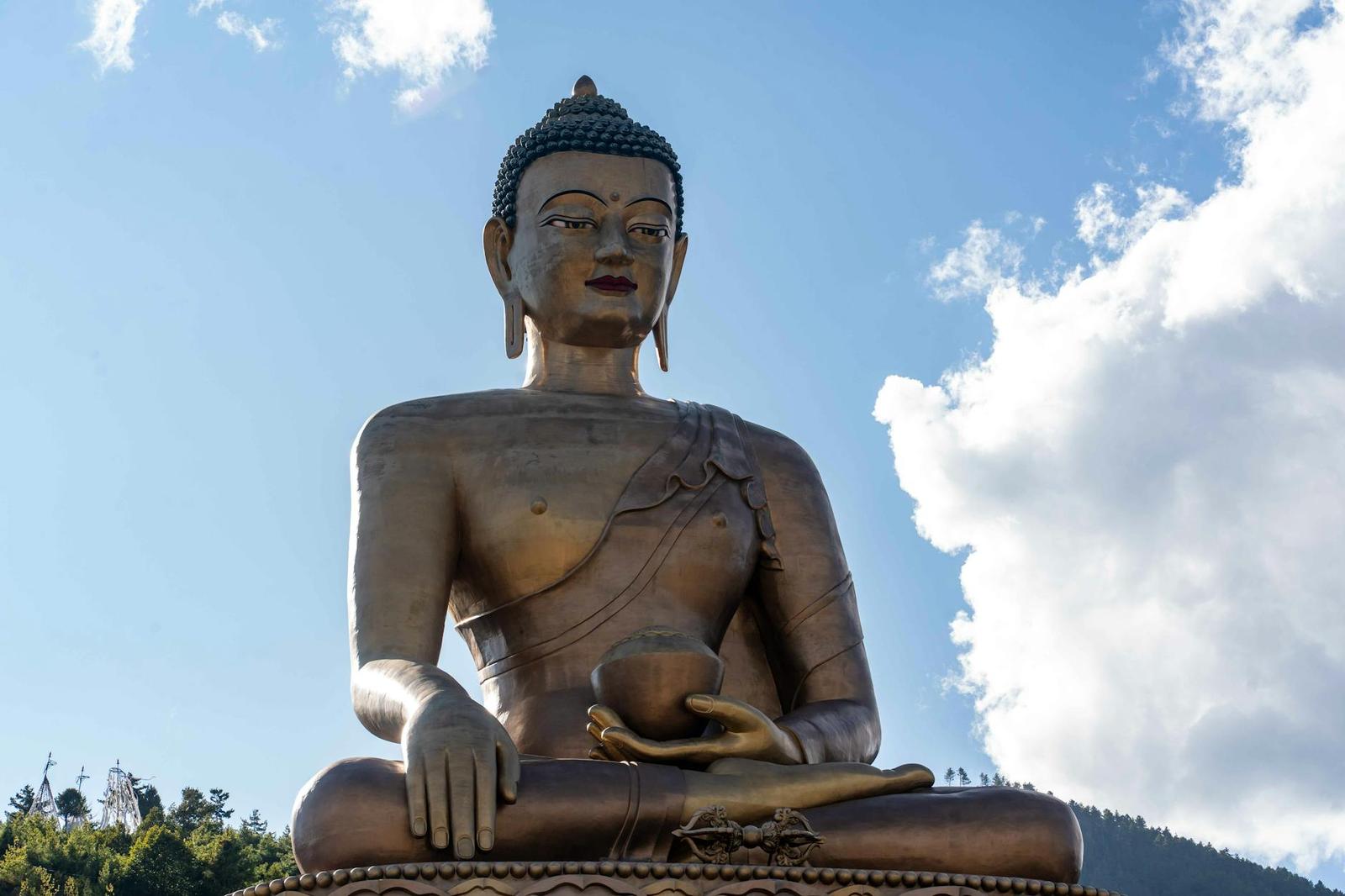 Majestic Buddha Dordenma statue against a serene sky in Thimphu, Bhutan