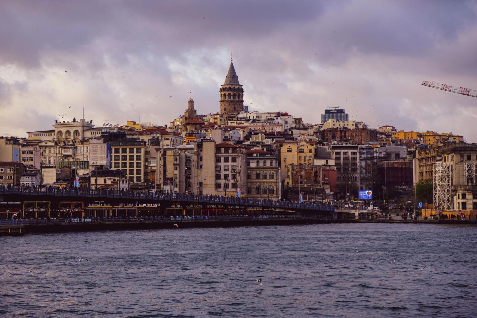 Scenic view of Istanbul with the iconic Galata Tower and bustling waterfront, perfect for travel enthusiasts