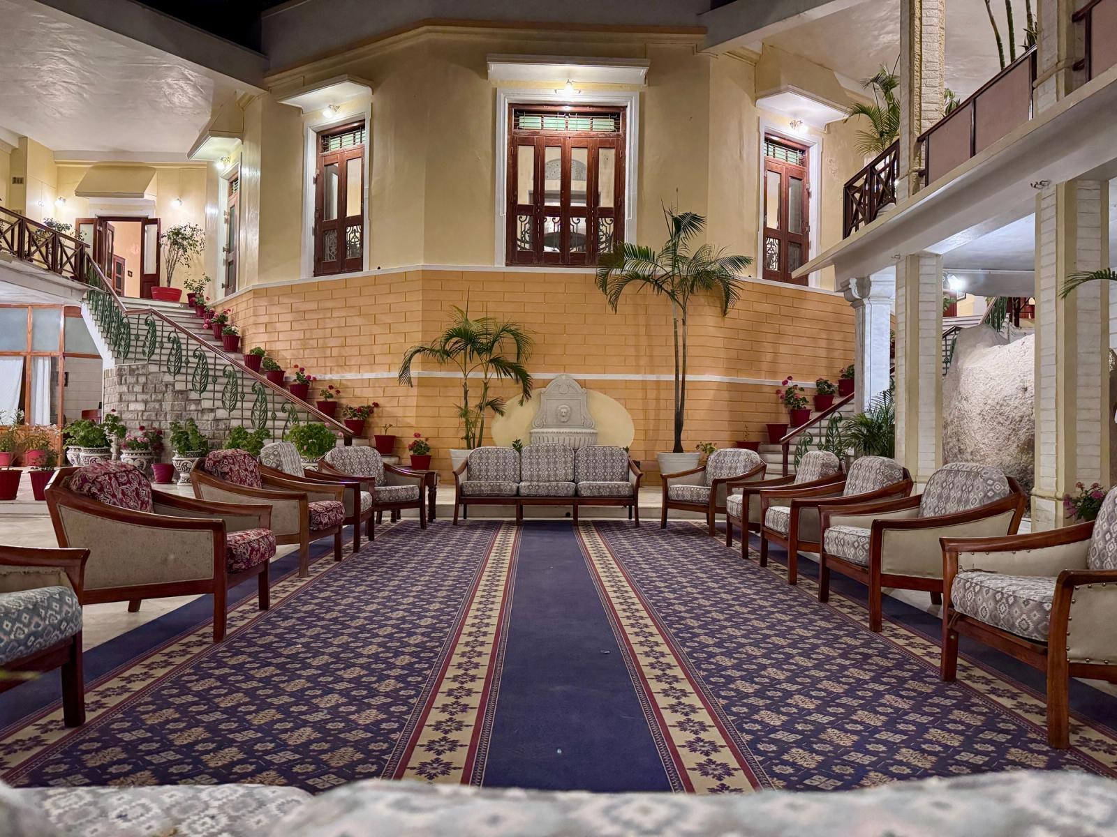 Beautifully arranged seating area in a villa lobby with elegant decor and intricate design