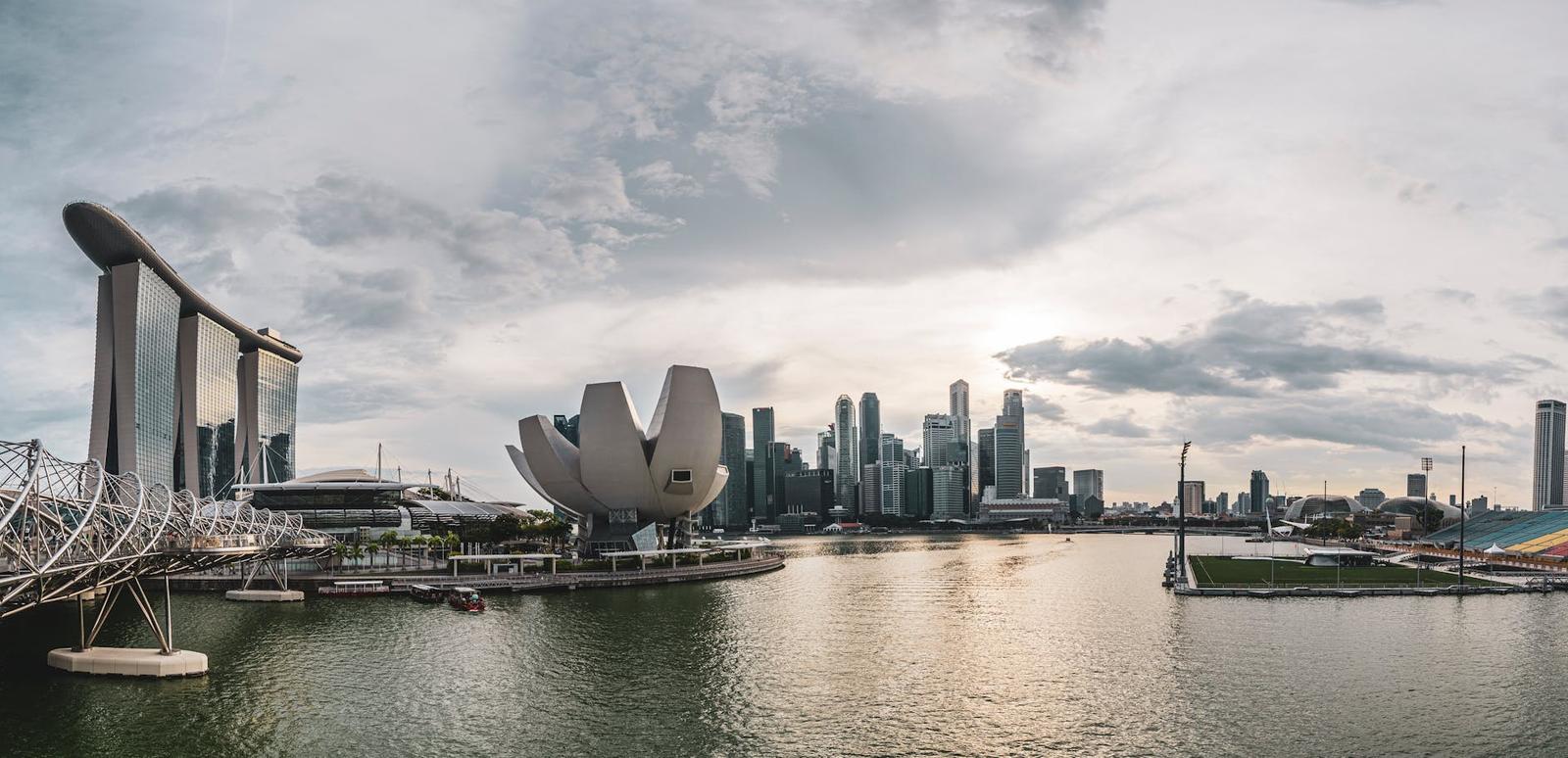 Panoramic view of Singapore skyline featuring modern architecture along the waterfront
