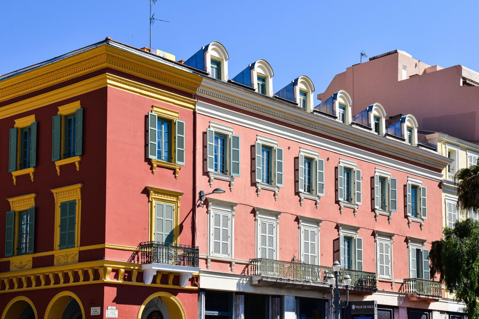 Elegant building in Nice, France, featuring classic French architecture with colorful facades