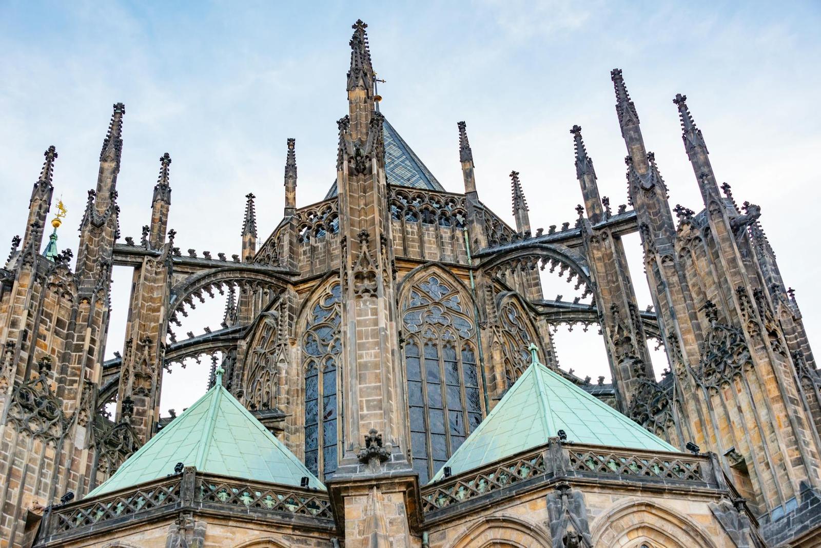 Explore the intricate Gothic architecture of St. Vitus Cathedral in Prague, a stunning landmark