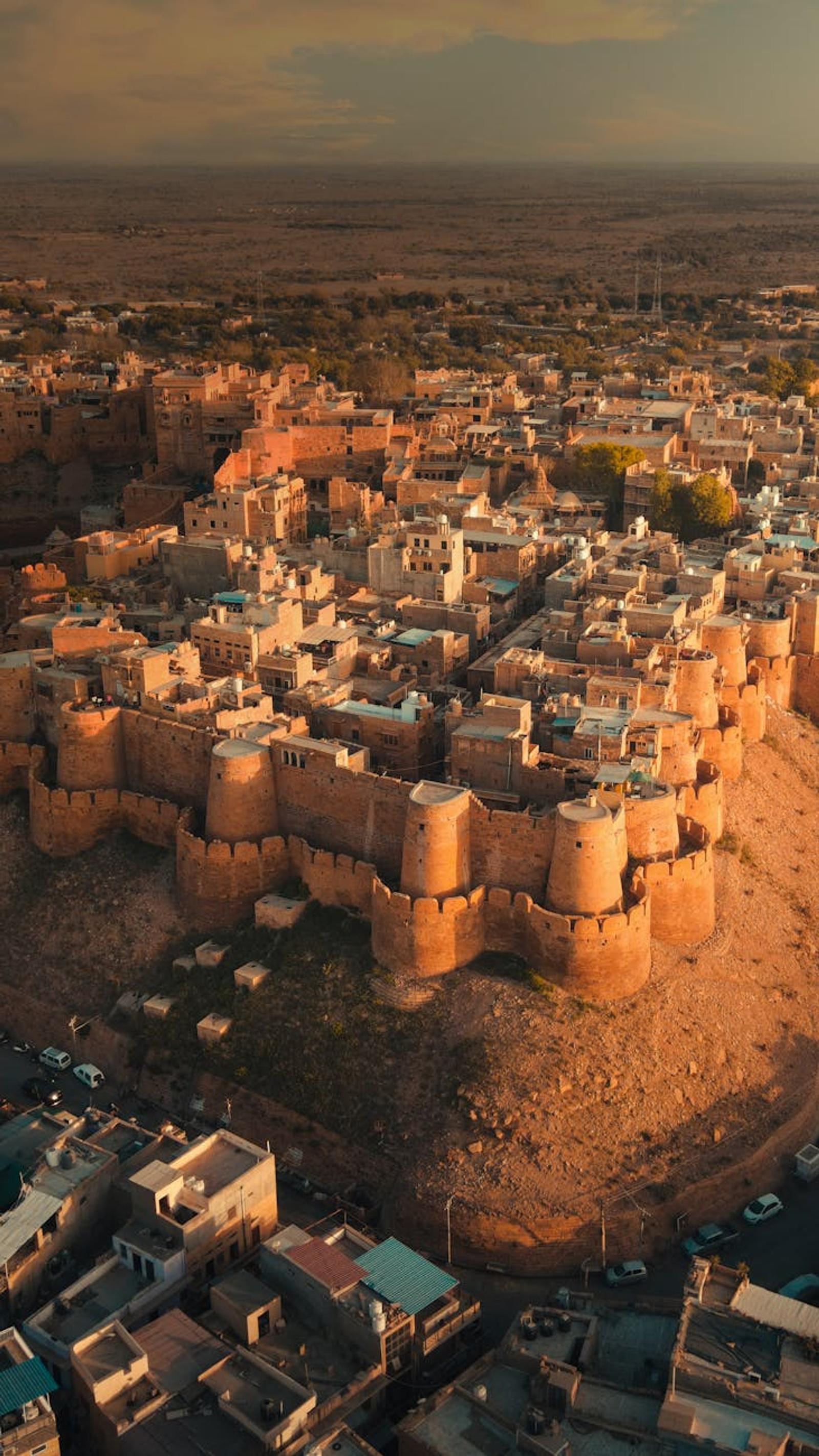 Breathtaking aerial view of the historic Jaisalmer Fort in Rajasthan, India at sunset