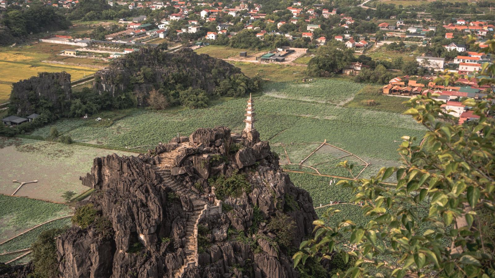 A breathtaking aerial shot of Mua Cave, showcasing the landscape of Ninh Binh, Vietnam
