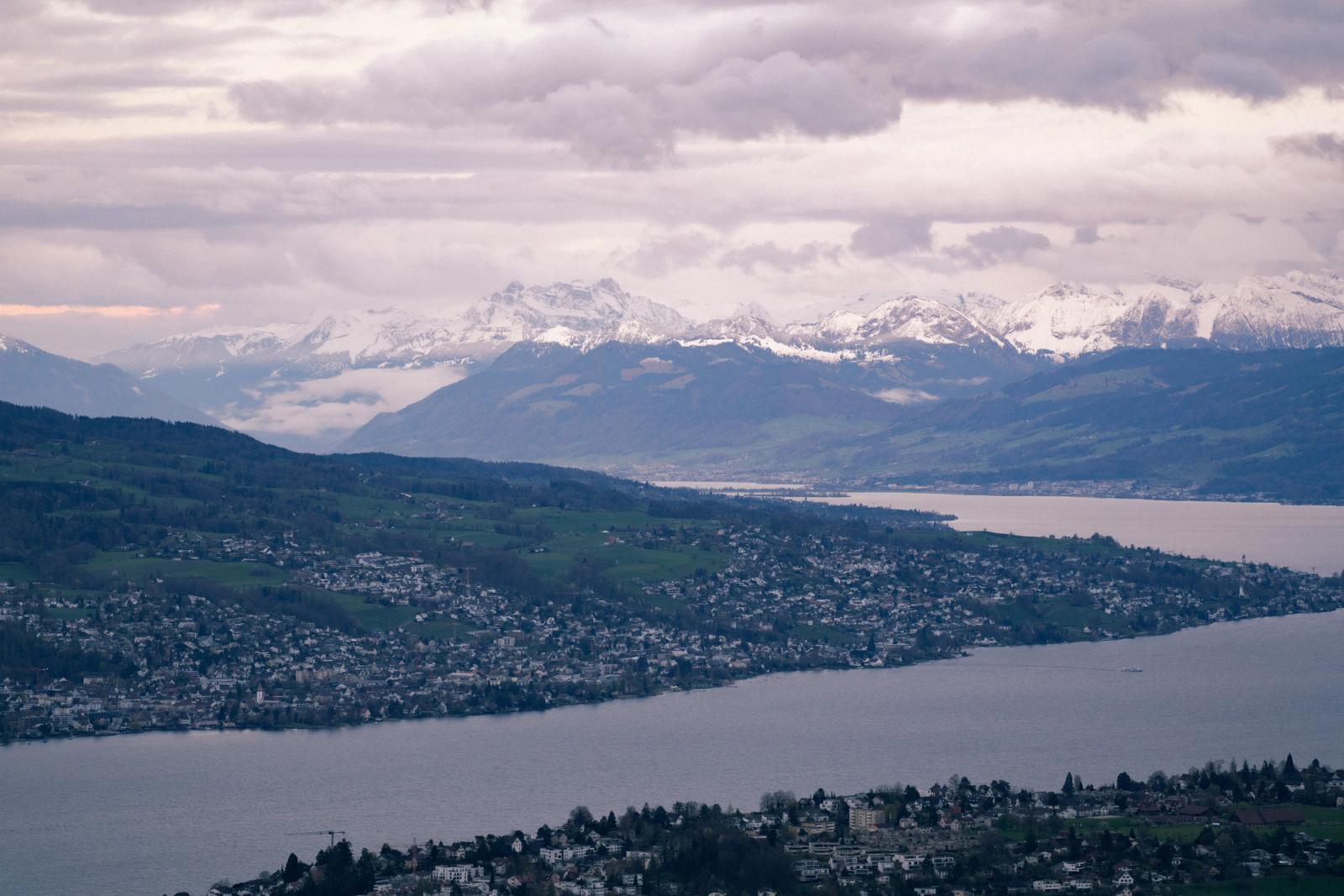 Panoramic view of Zurich with Lake Zurich and the snow-capped Swiss Alps in the background