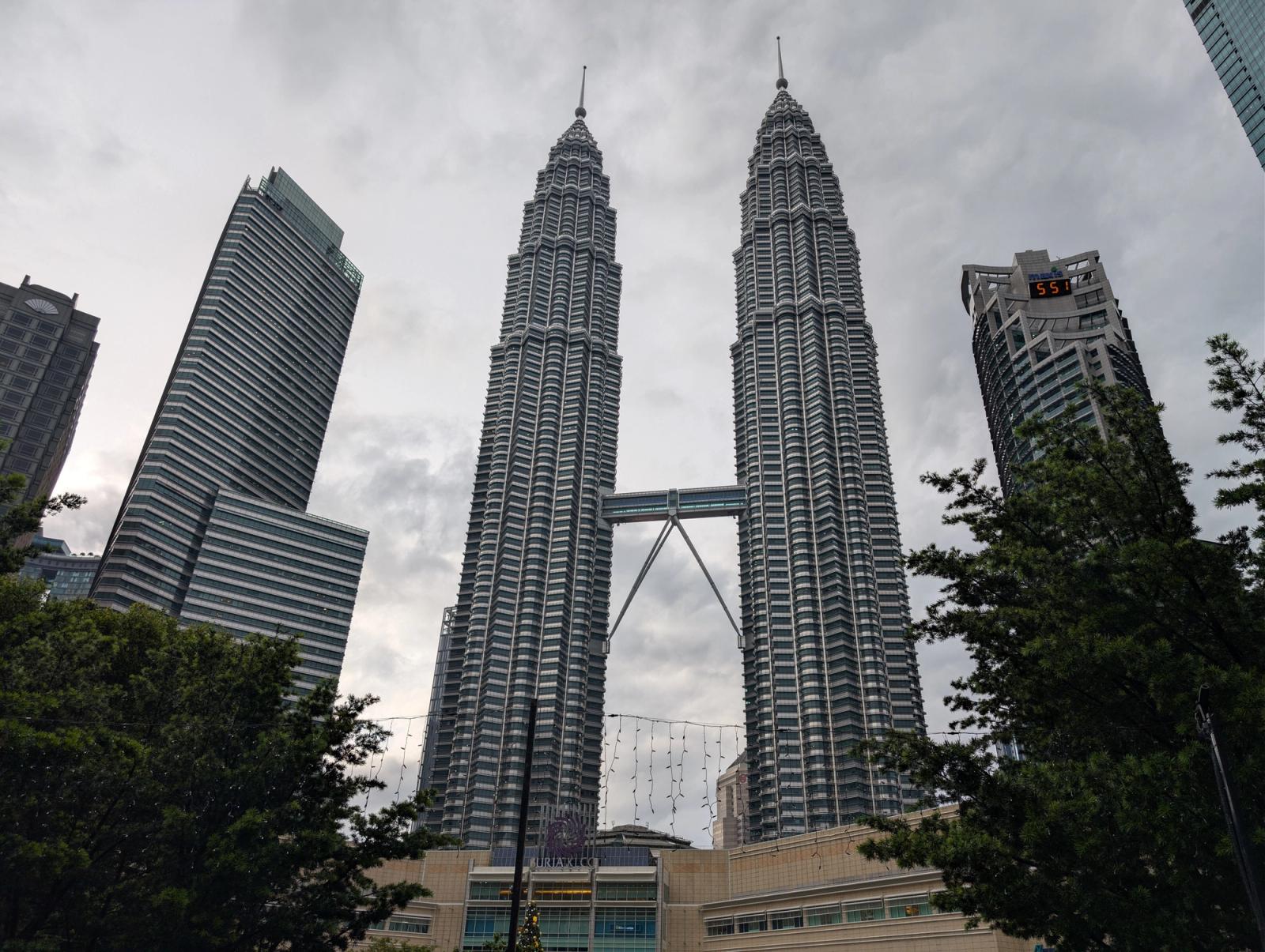 Stunning view of the Petronas Twin Towers in Kuala Lumpur, Malaysia. Iconic modern architecture